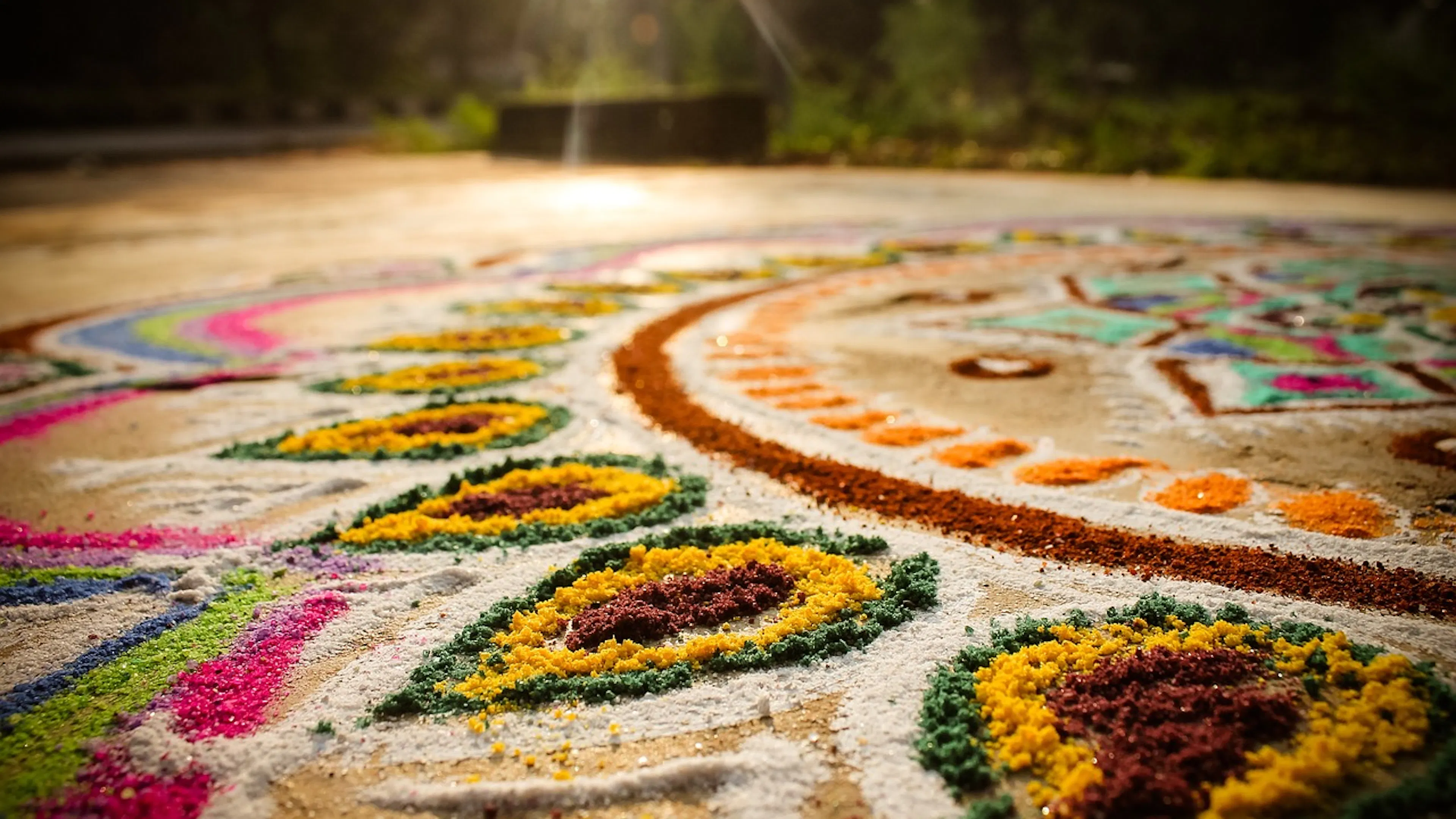 A close up of a colorful sand mandala during Diwali 