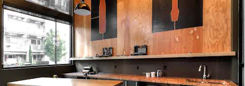 The woodworking space in the DIY maker space at AMLI South Lake Union apartments with work bench and tools