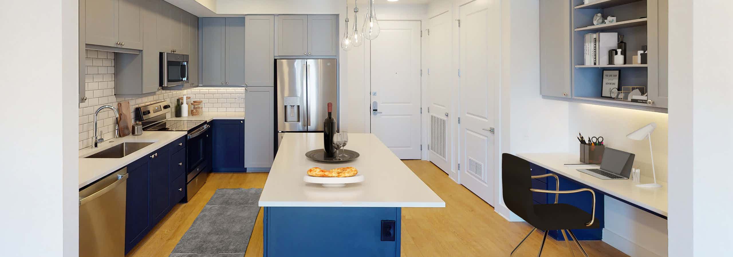 Island kitchen with built-in desk & quartz countertops