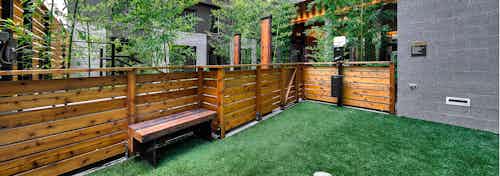Second outdoor Pet Run with brown fencing bench at AMLI South Lake Union