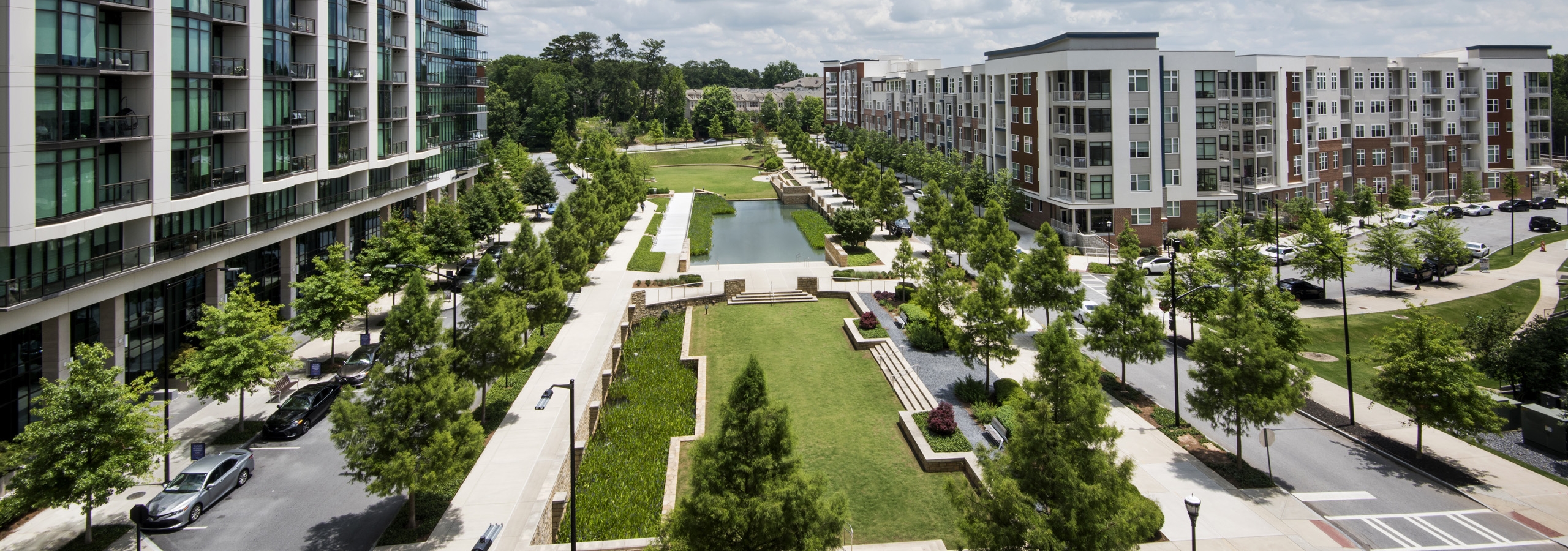 Overhead view of Marie Sims Park and tree lined streets with AMLI 3464 on the left and AMLI Buckhead on the right