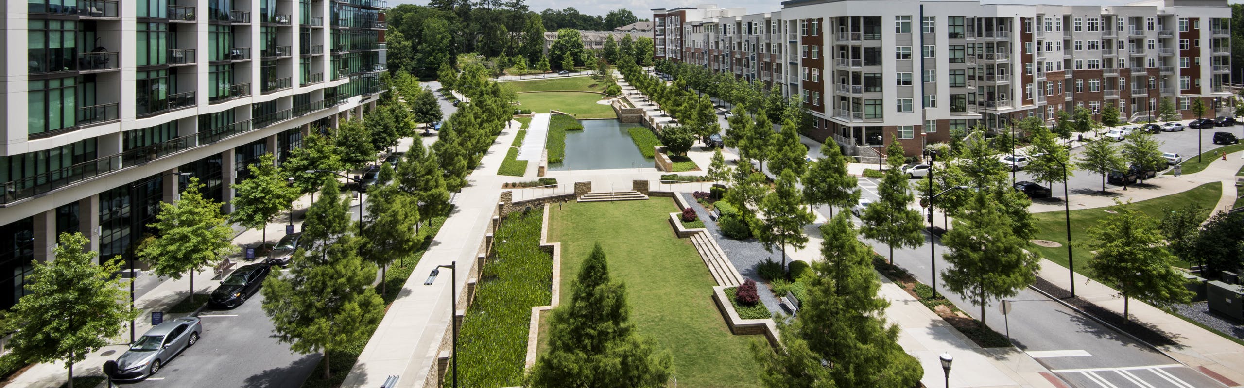 Overhead view of Marie Sims Park and tree lined streets with AMLI 3464 on the left and AMLI Buckhead on the right