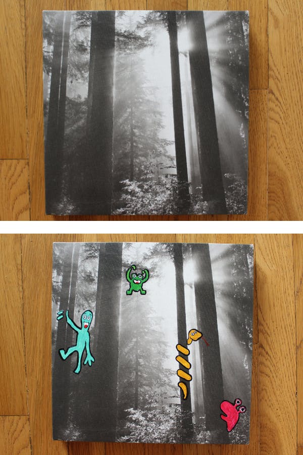 A side by side photo of a printed photo of a forest with little monsters painted onto the canvas