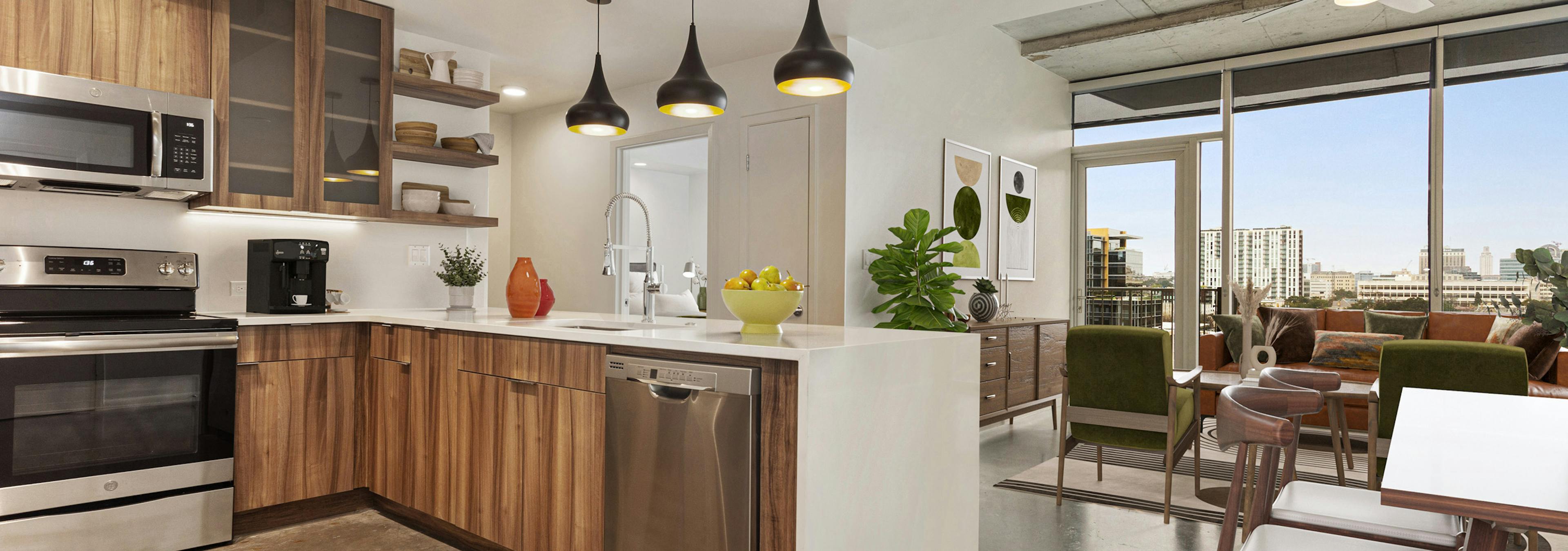 AMLI on 2ND kitchen with wood grain cabinets and 3 pendant lights adjacent to living room with floor to ceiling windows 