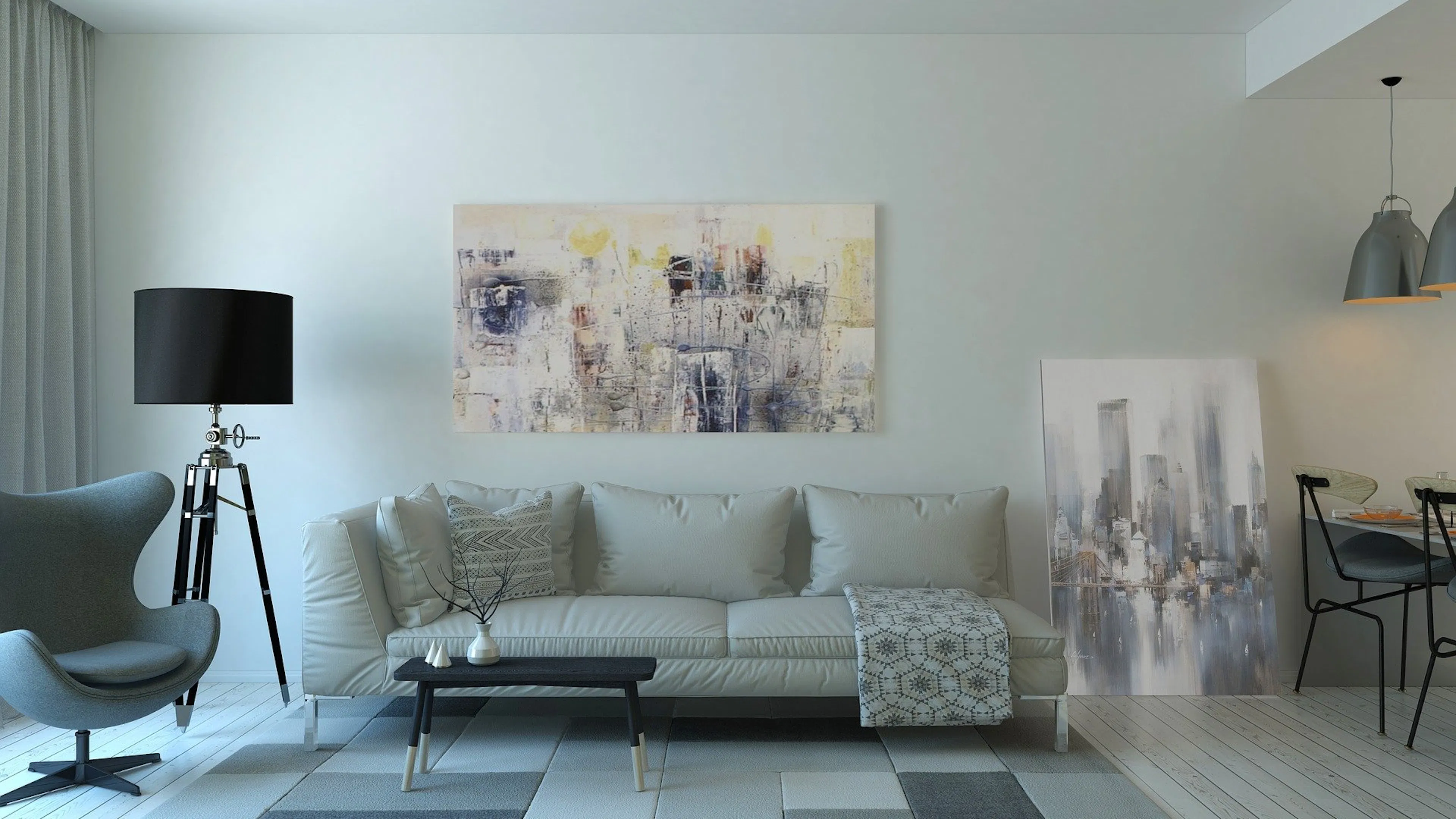 The interior of a living room decorated with grey lamps and carpets and paintings