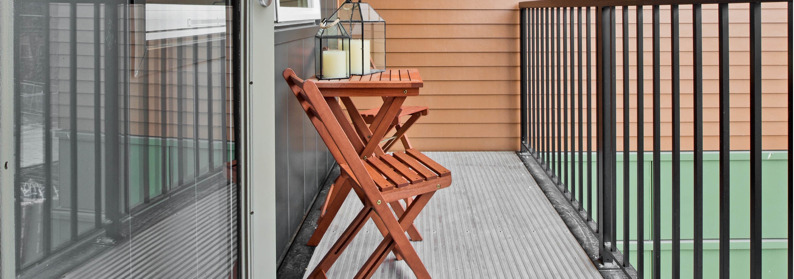 Exterior view of AMLI Mark24 apartment patio with plenty of space for patio furniture and plants and flowers