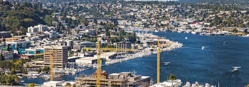Blue Sky sunny Seattle Day Exterior view from AMLI Arc of Lake Union Wallingford and Westlake Ave from the 41st floor