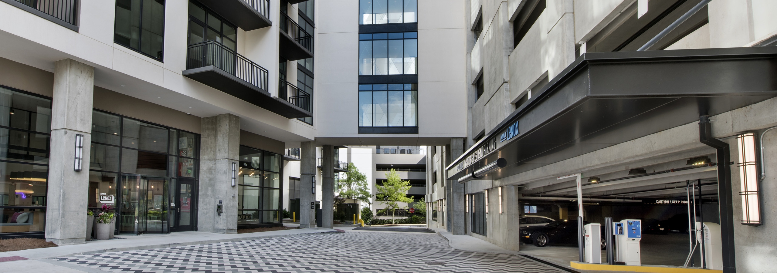 Exterior view of AMLI Lenox parking garage with bridge connecting the parking facility with the apartment building