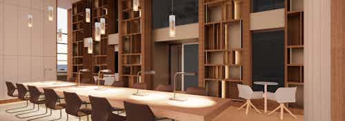 Rendering of two story co working space with wall of wood bookshelves and long table with 14 chairs and pendant lights hanging above