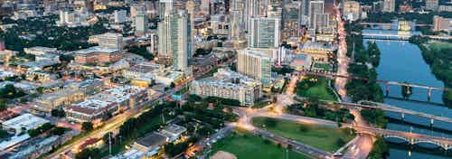 Aerial view of the Austin downtown skyline and river near AMLI 300