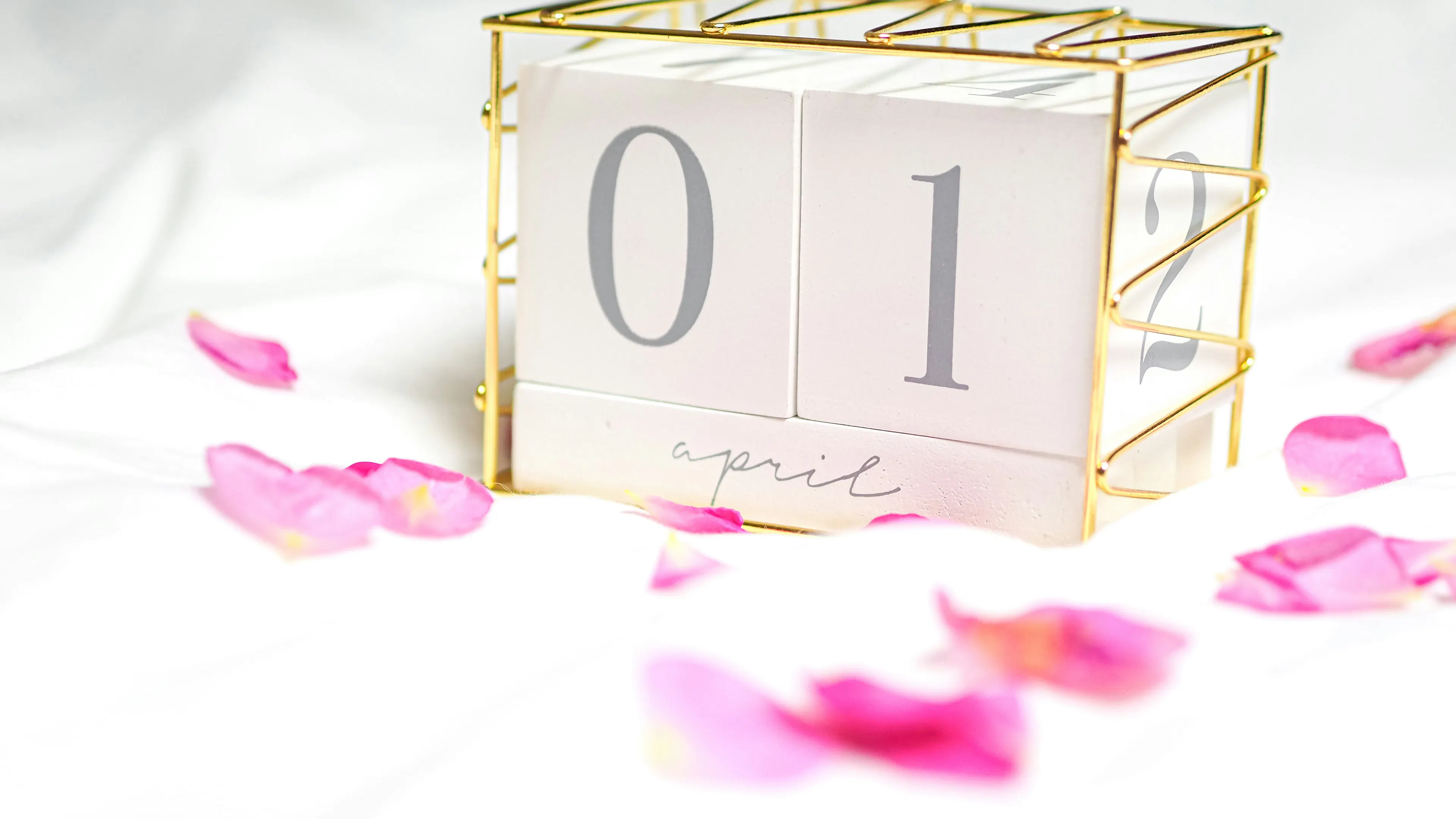 A small block calendar displaying the date of April 1