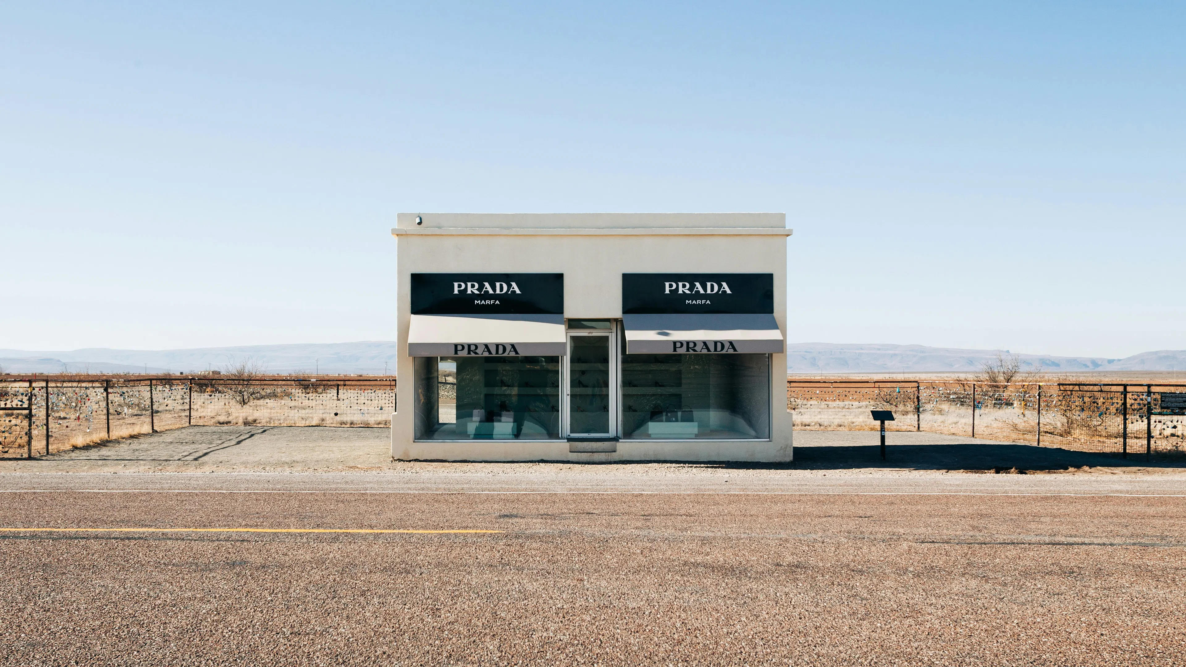 The exterior of the famous Prada store in Marfa surrounded by desert sands and open skies