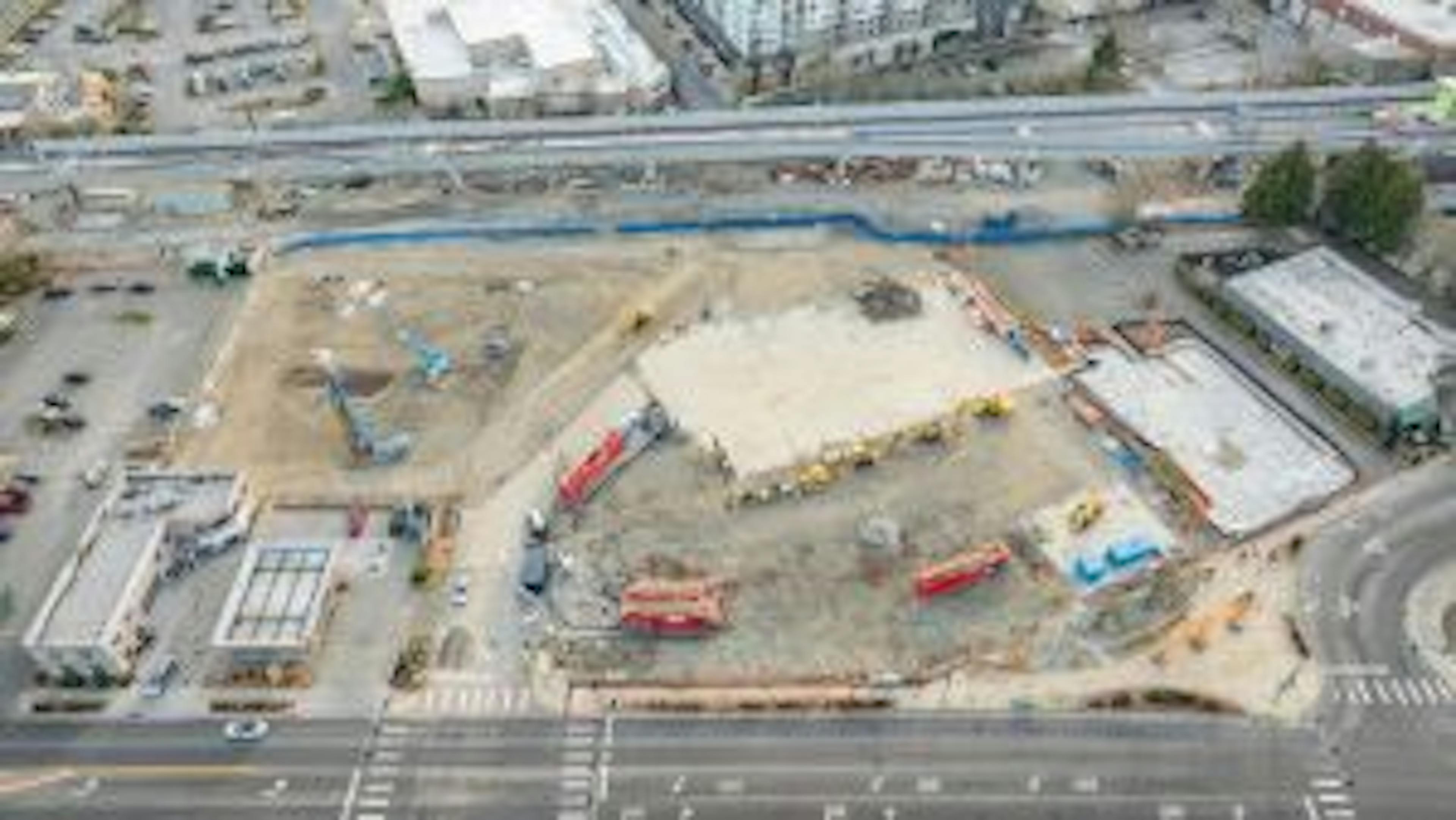 Aerial view of AMLI Redmond Way construction site with the start of shoring operations