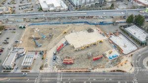 Aerial view of AMLI Redmond Way construction site with the start of shoring operations