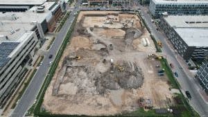Aerial view of AMLI Park Central construction site with excavating beginning on the west garage