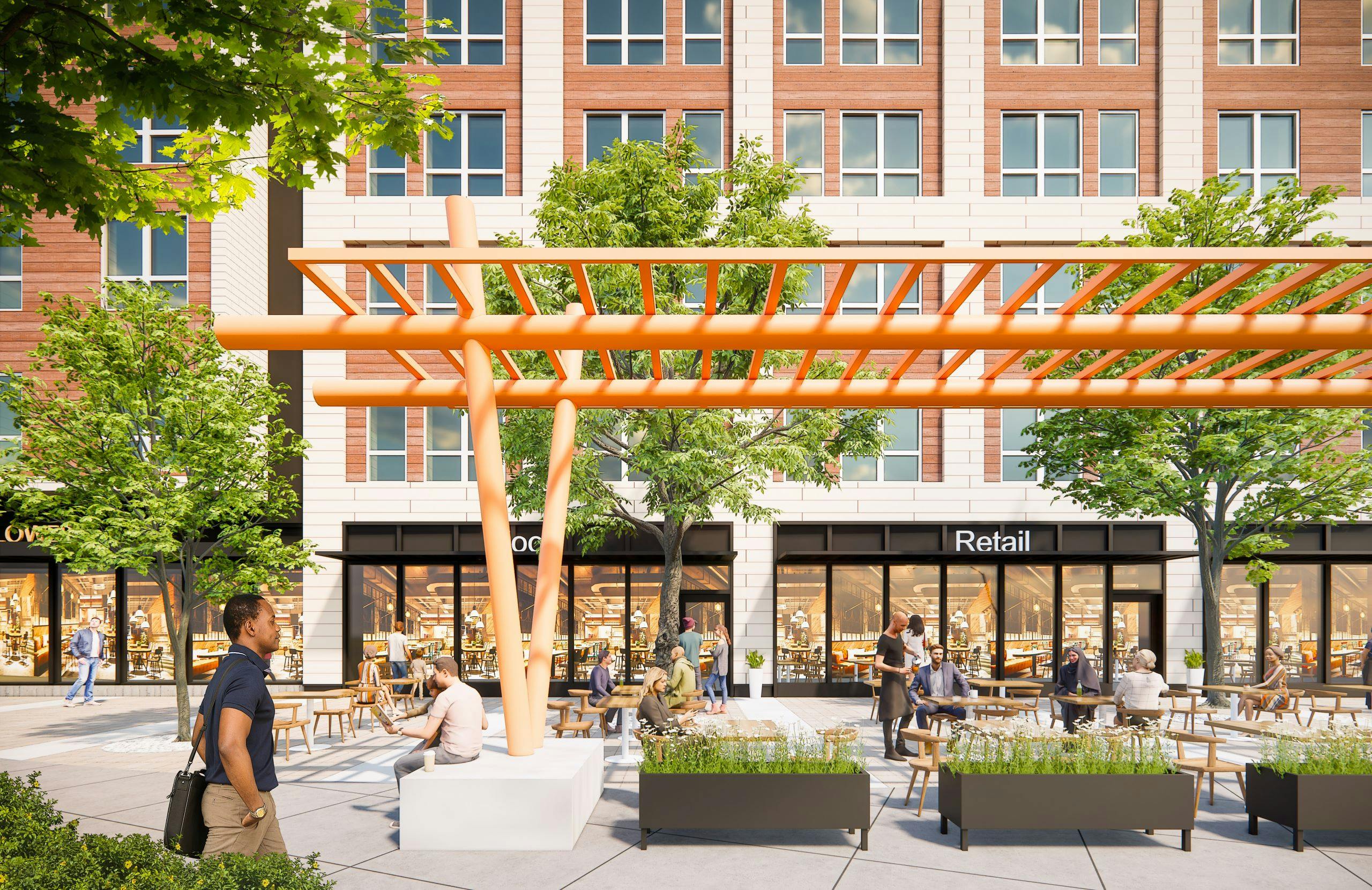 Outdoor plaza at AMLI Redmond Way with orange metal sculpture trees planters and people walking near retail shops