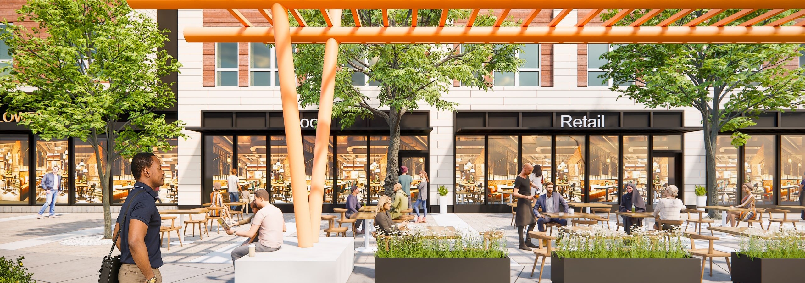 Outdoor plaza at AMLI Redmond Way with orange metal sculpture trees planters and people walking near retail shops