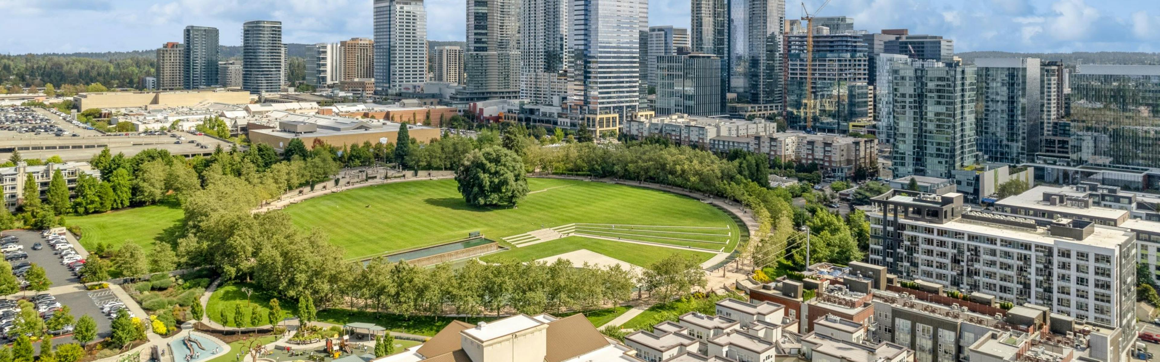Aerial view of Downtown Bellevue Park and neighborhood surrounding AMLI Bellevue Park apartments with skyline in distance