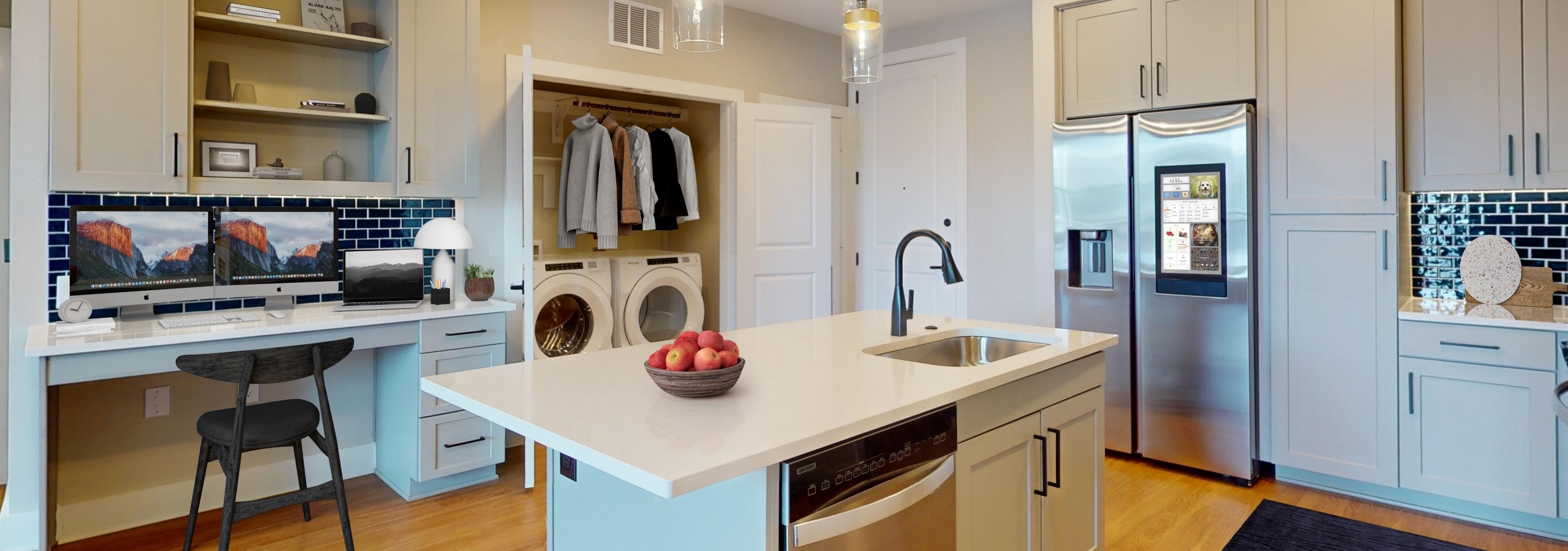 AMLI North Park kitchen with a built in desk, gray cabinets and stainless steel appliances including a smart refrigerator