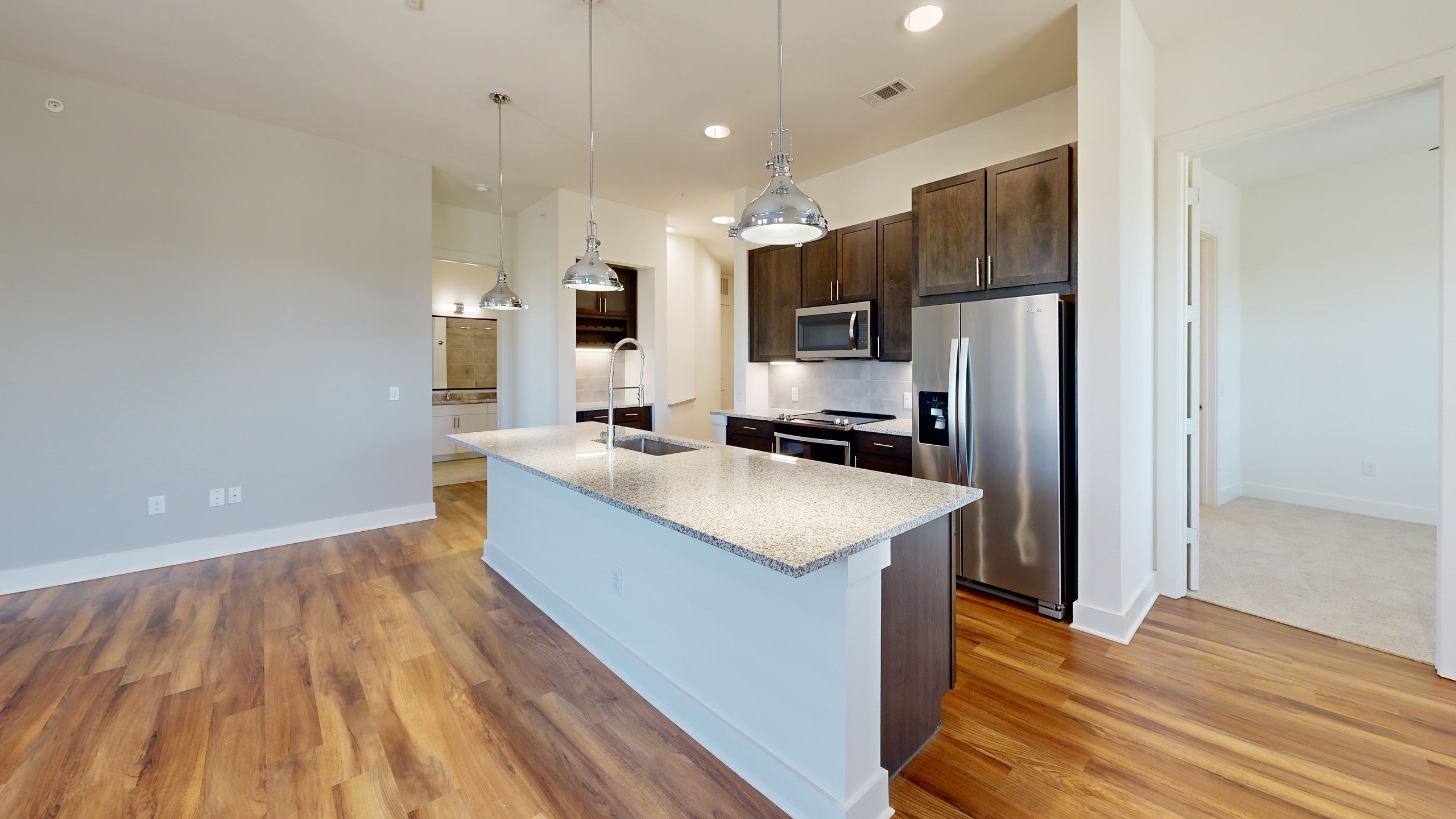AMLI Grapevine kitchen with island and appliances 