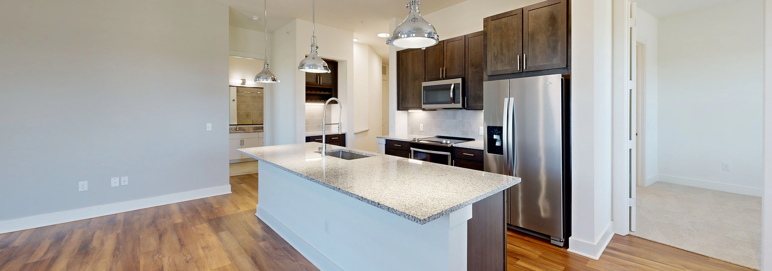 AMLI Grapevine kitchen with island and appliances