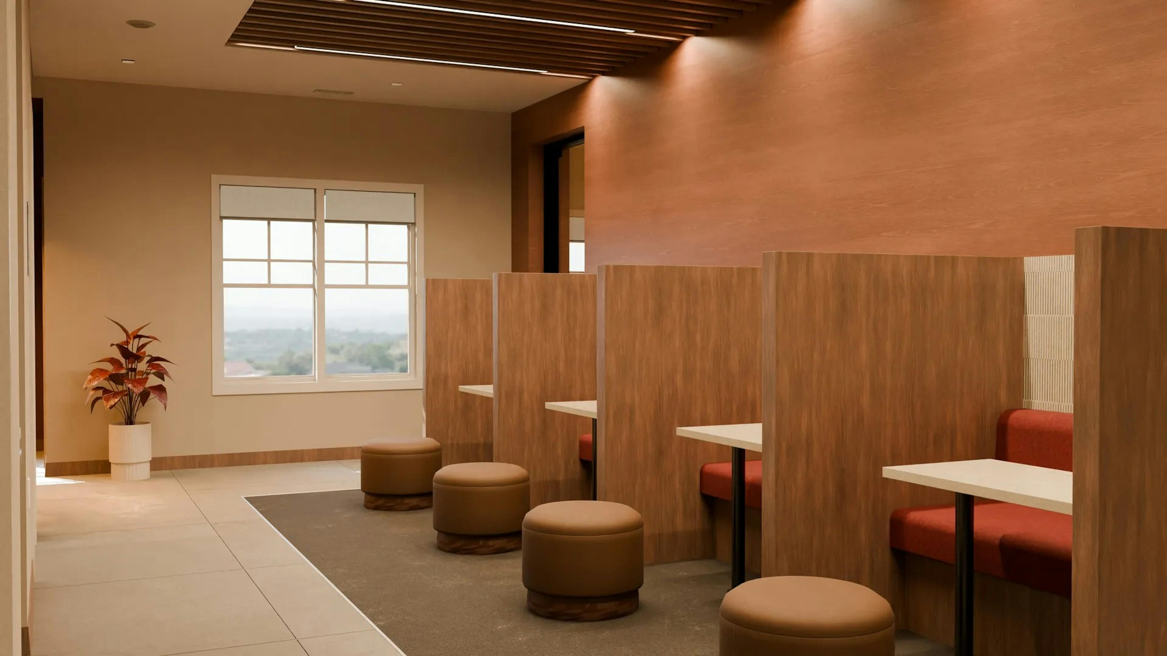 Rendering of coworking space at AMLI Brookhaven apartments with red booths and wood tables with round leather stools and wood dividers