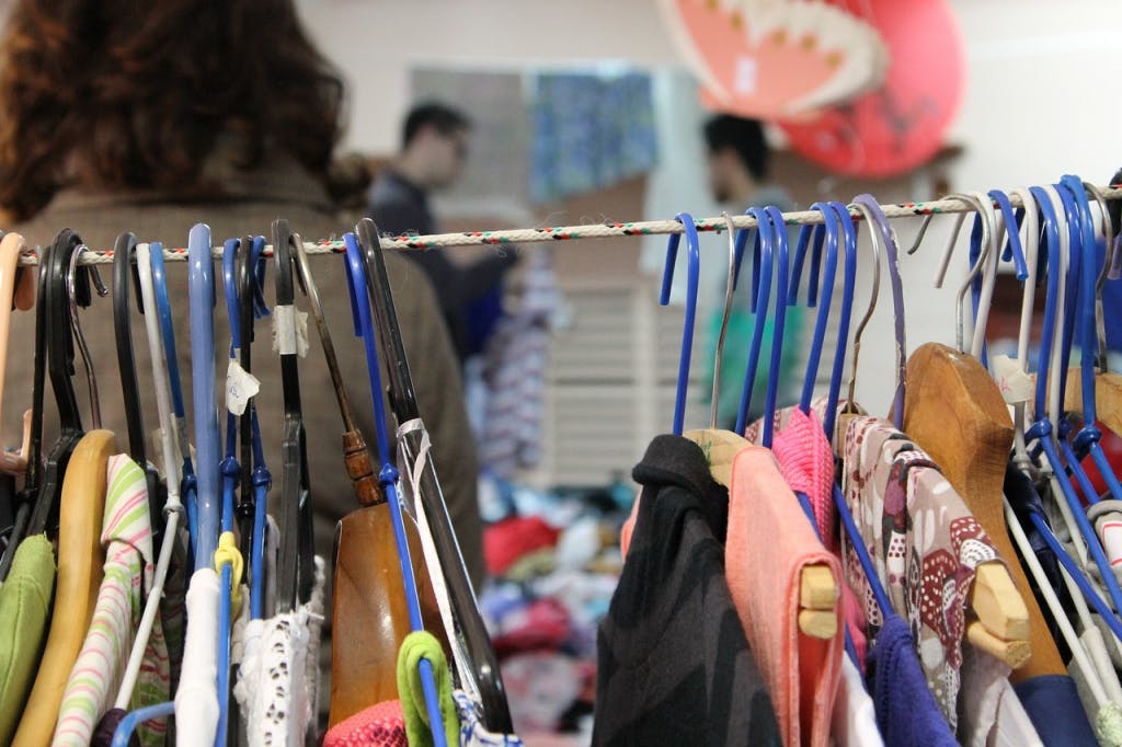 Thift store clothes on rack