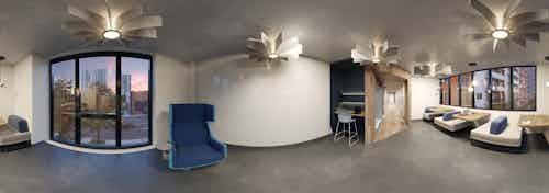 Panoramic rendering of AMLI Midtown Miami apartments The Collaborative co-working area with computer station and booth seating