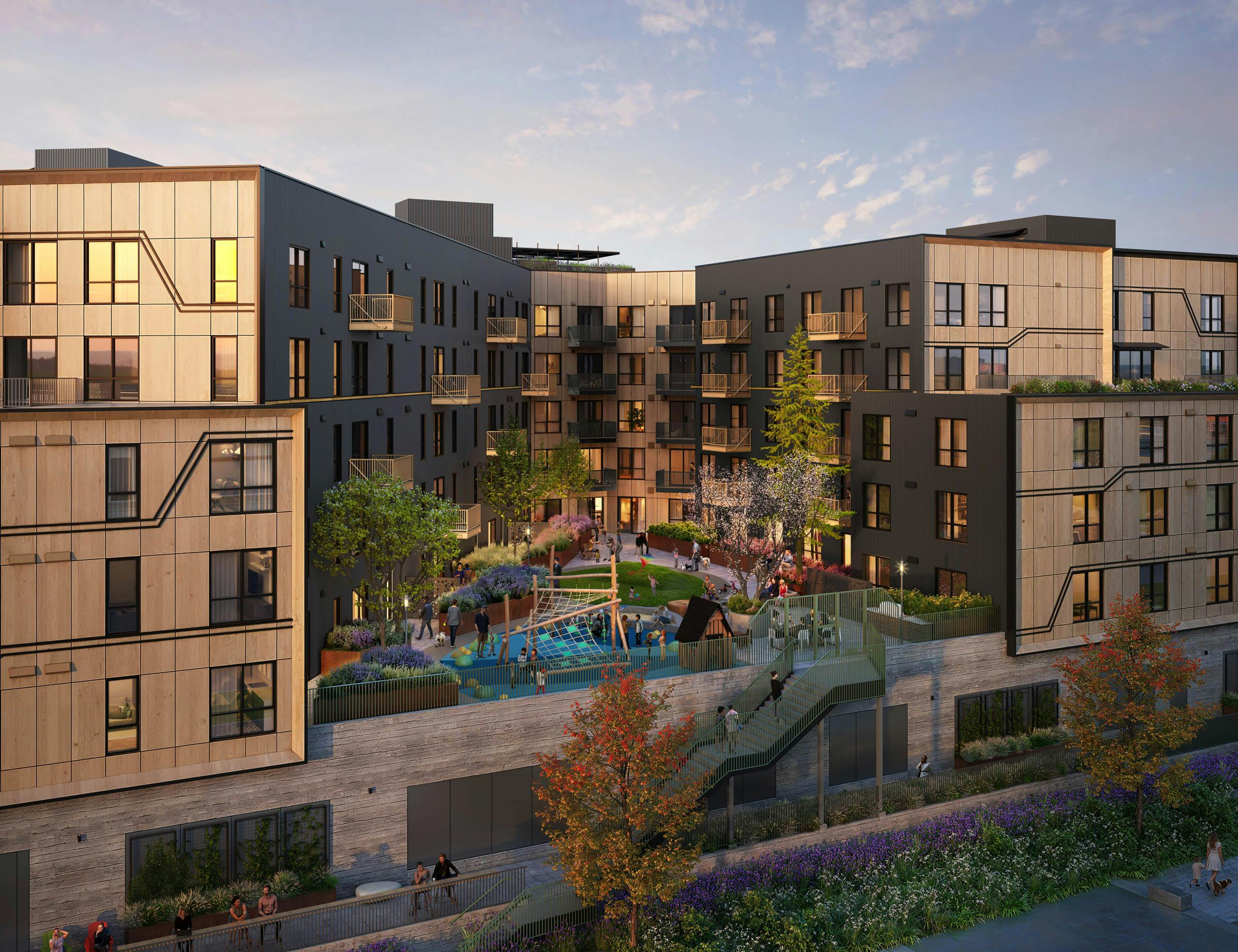 Modern residential building at AMLI Redmond Way apartments with landscaped courtyard and children's playground