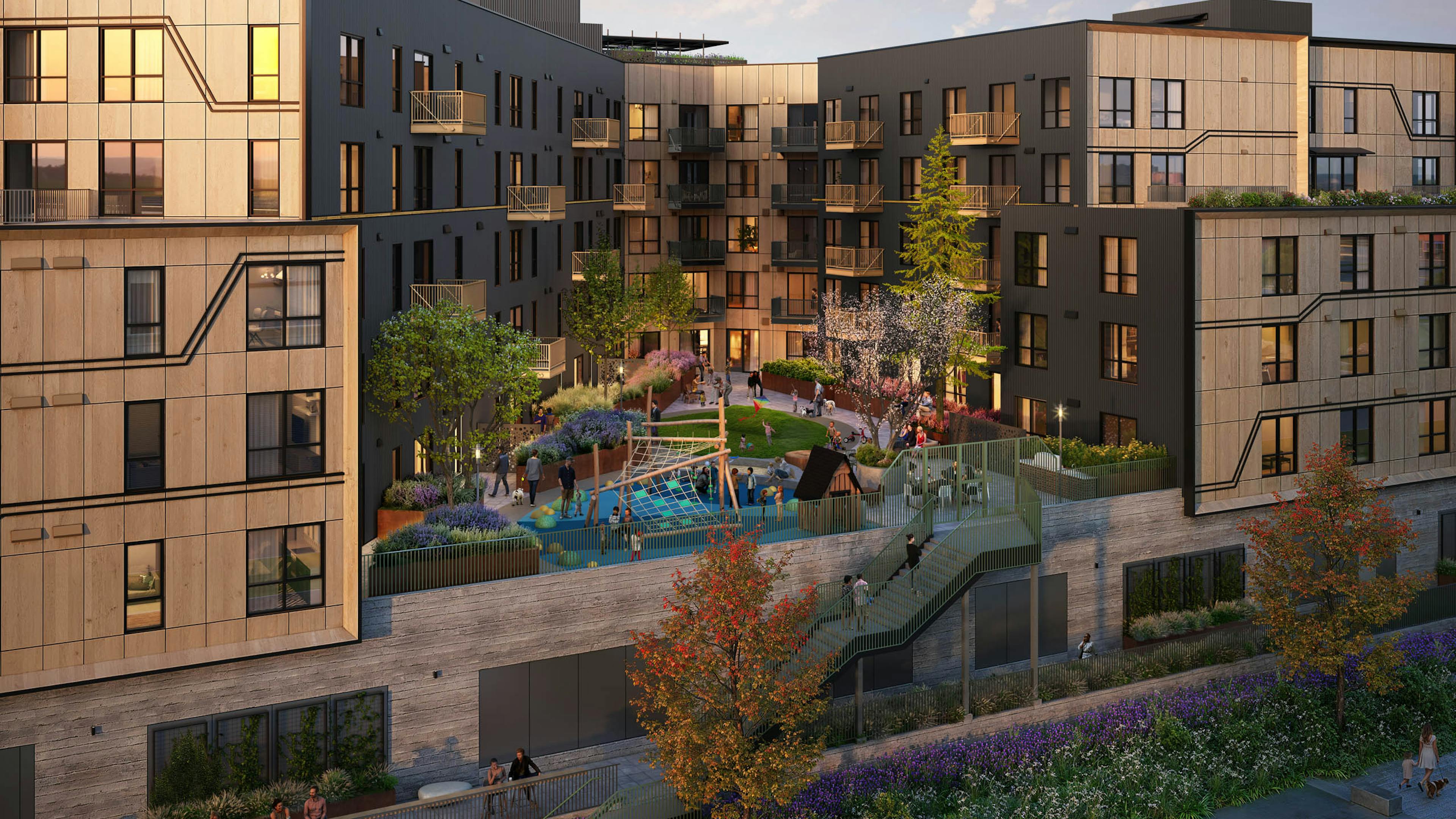 Modern residential building at AMLI Redmond Way apartments with landscaped courtyard and children's playground