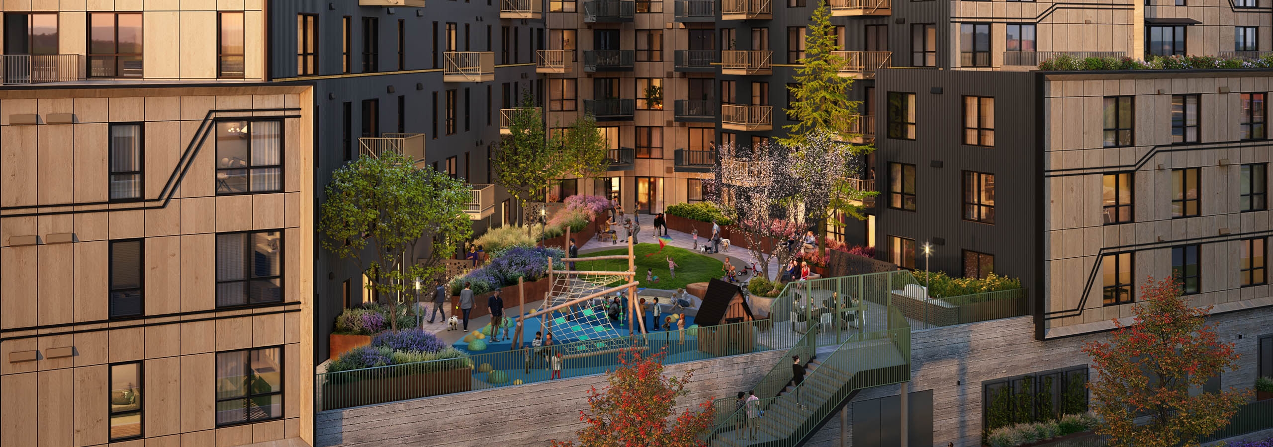 Modern residential building at AMLI Redmond Way apartments with landscaped courtyard and children's playground