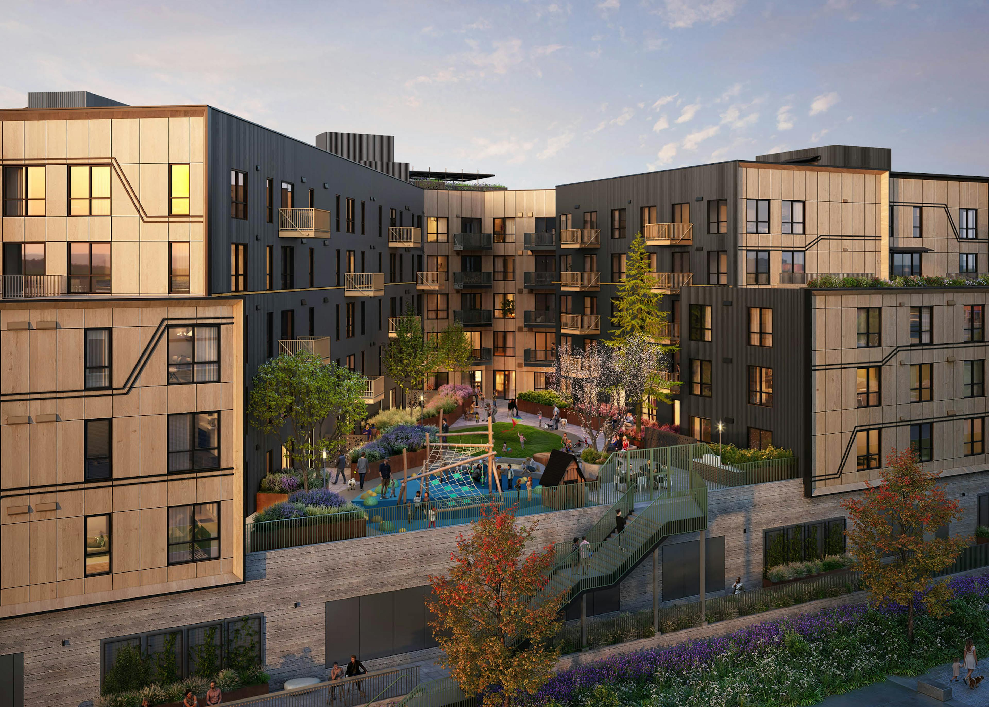 Modern residential building at AMLI Redmond Way apartments with landscaped courtyard and children's playground