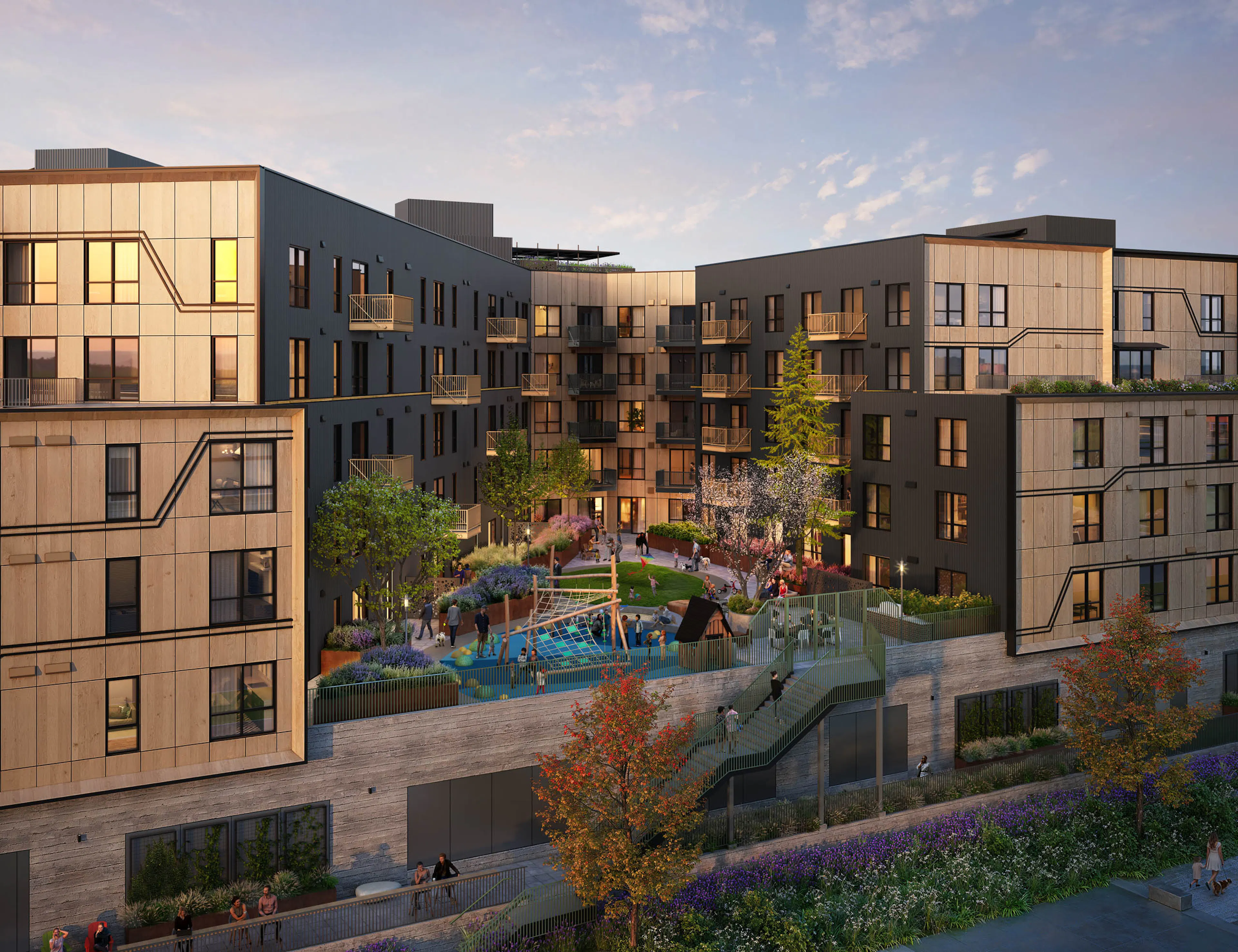 Modern residential building at AMLI Redmond Way apartments with landscaped courtyard and children's playground