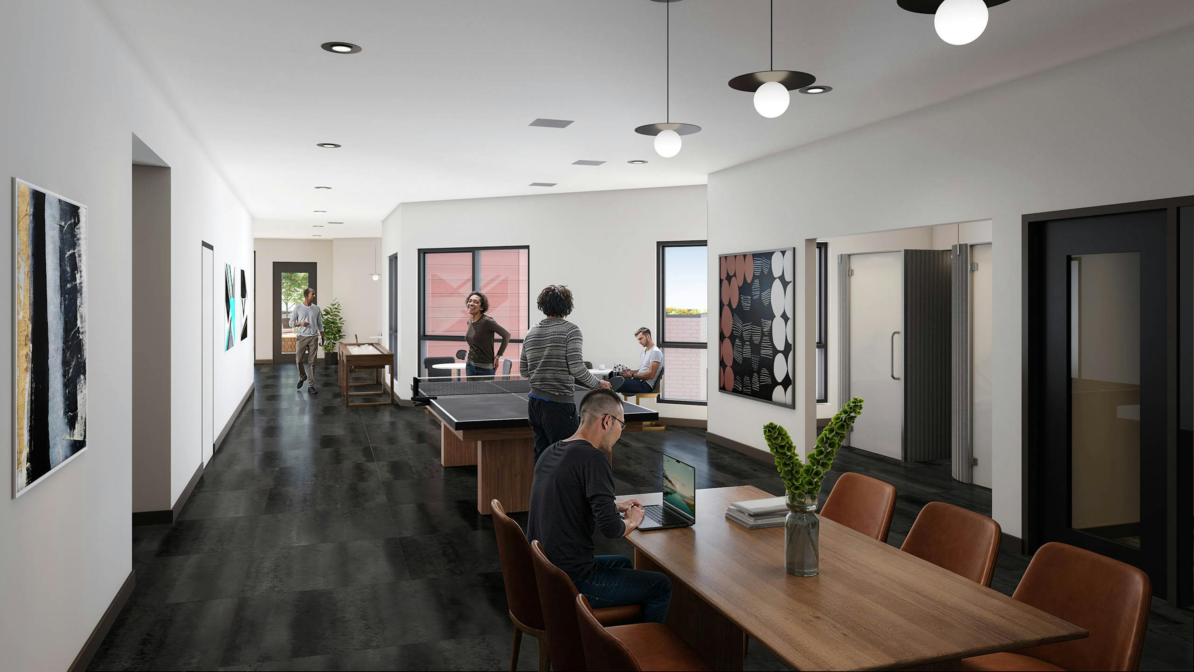 Rendering of coworking game room at AMLI Redmond Way with ping pong table, seating areas, and large windows
