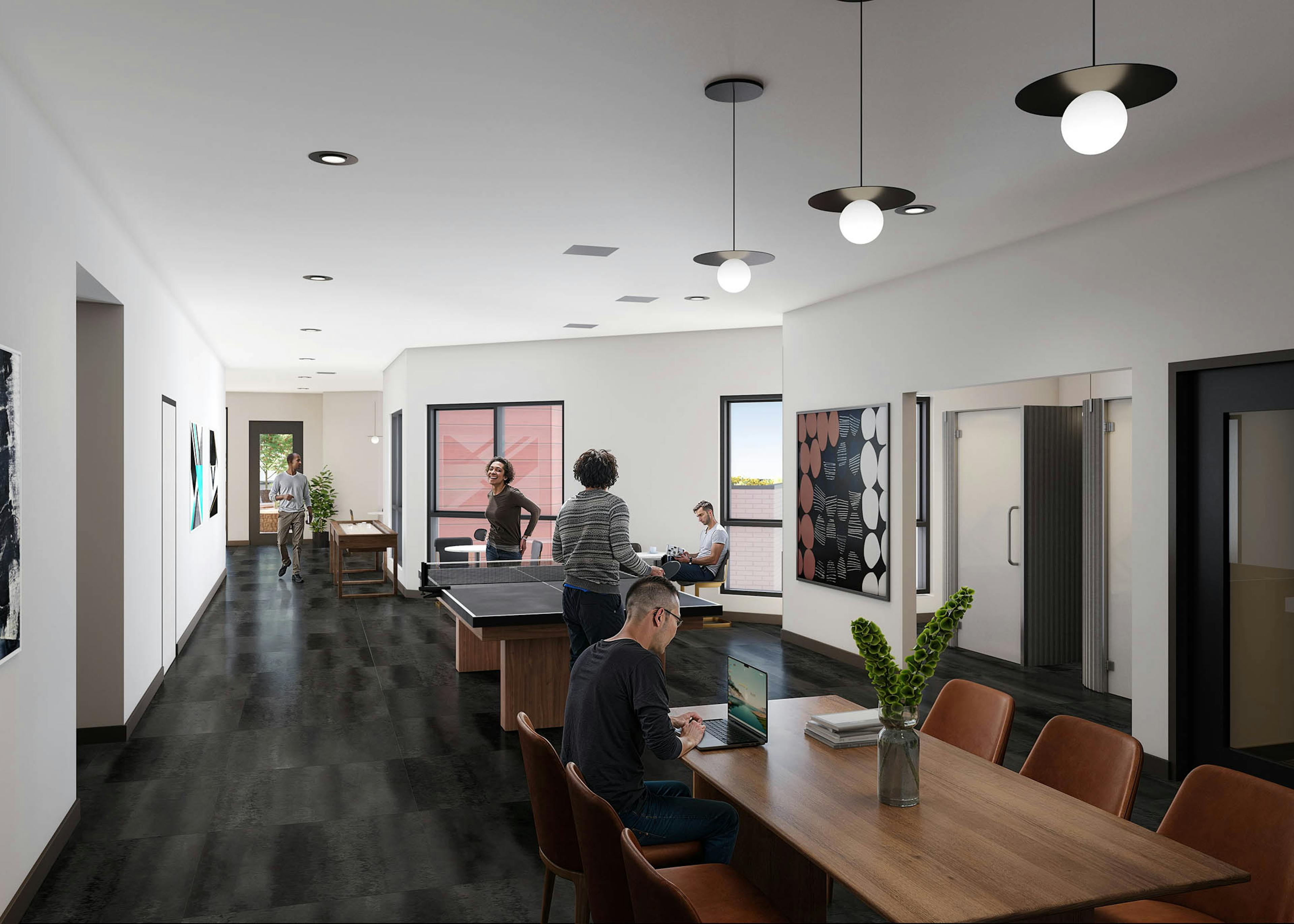 Rendering of coworking game room at AMLI Redmond Way with ping pong table, seating areas, and large windows