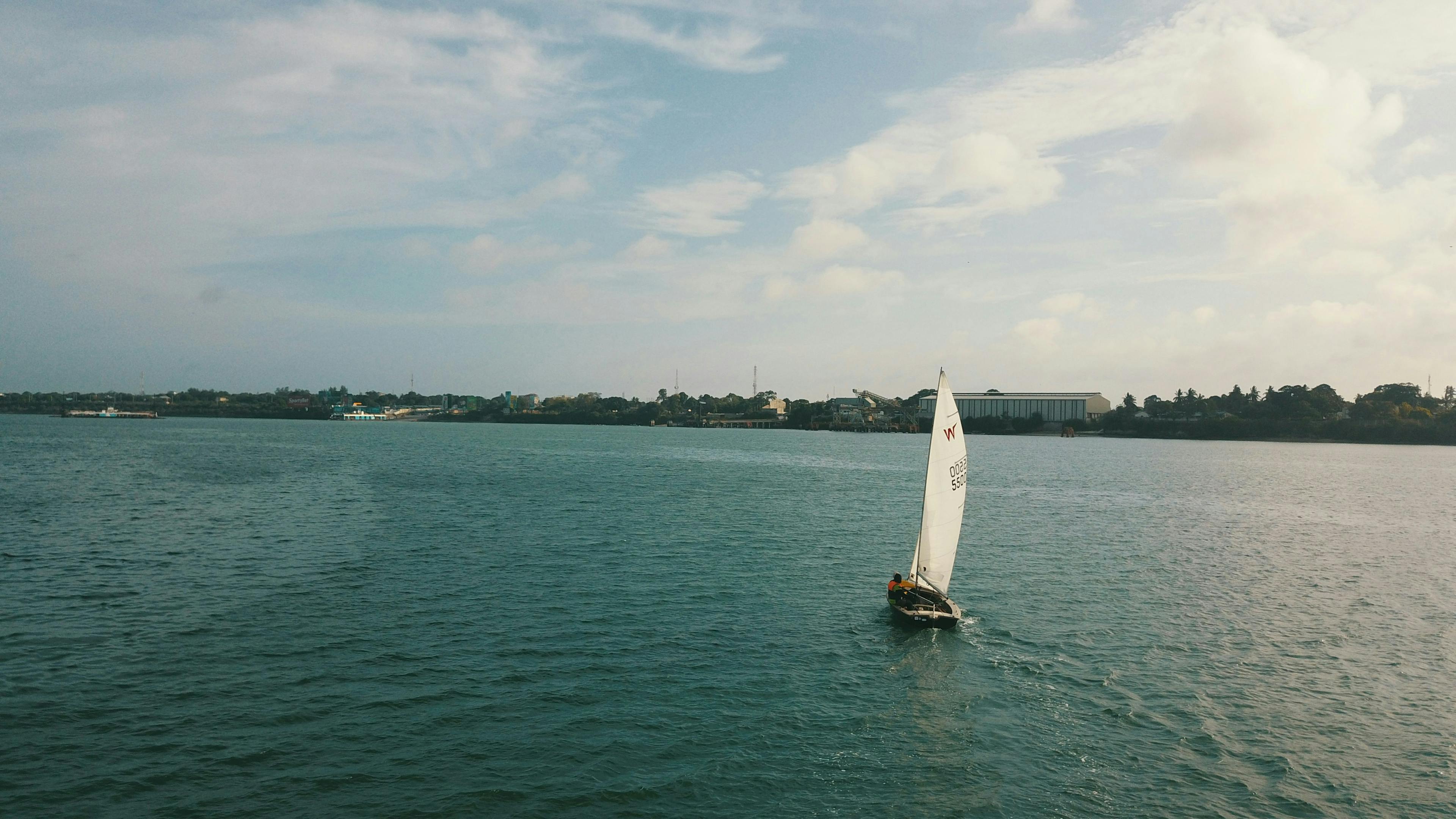 A sailboat cruising off the coast of Miami