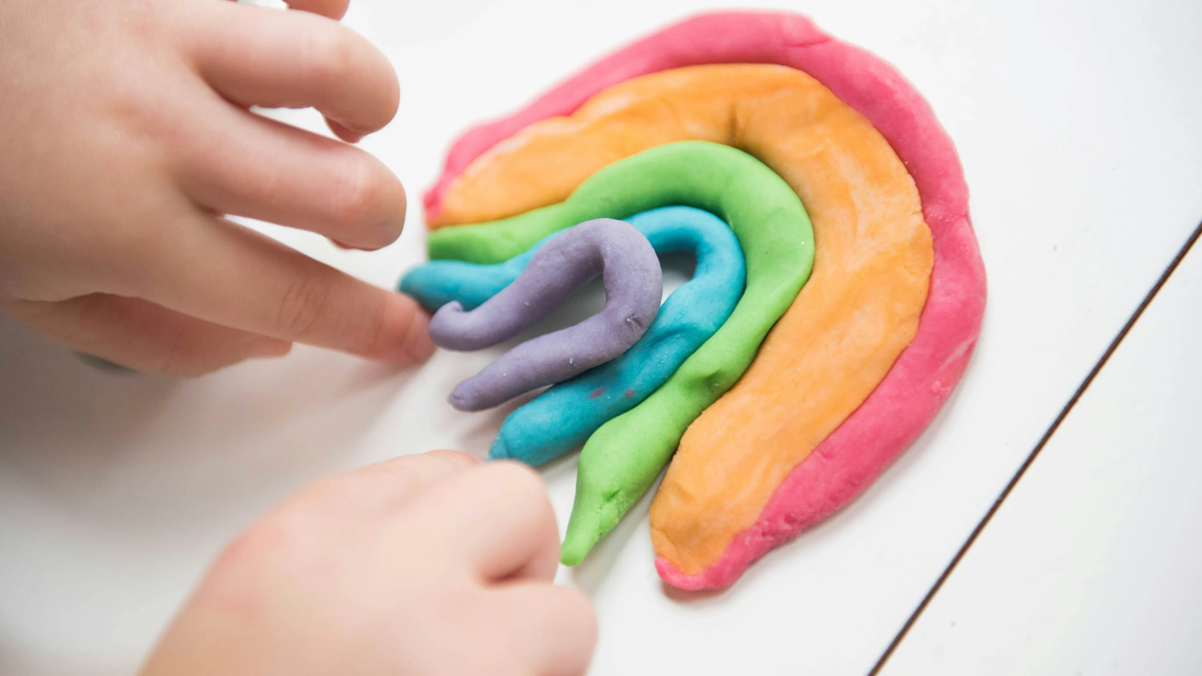 A rainbow made of colorful play dough