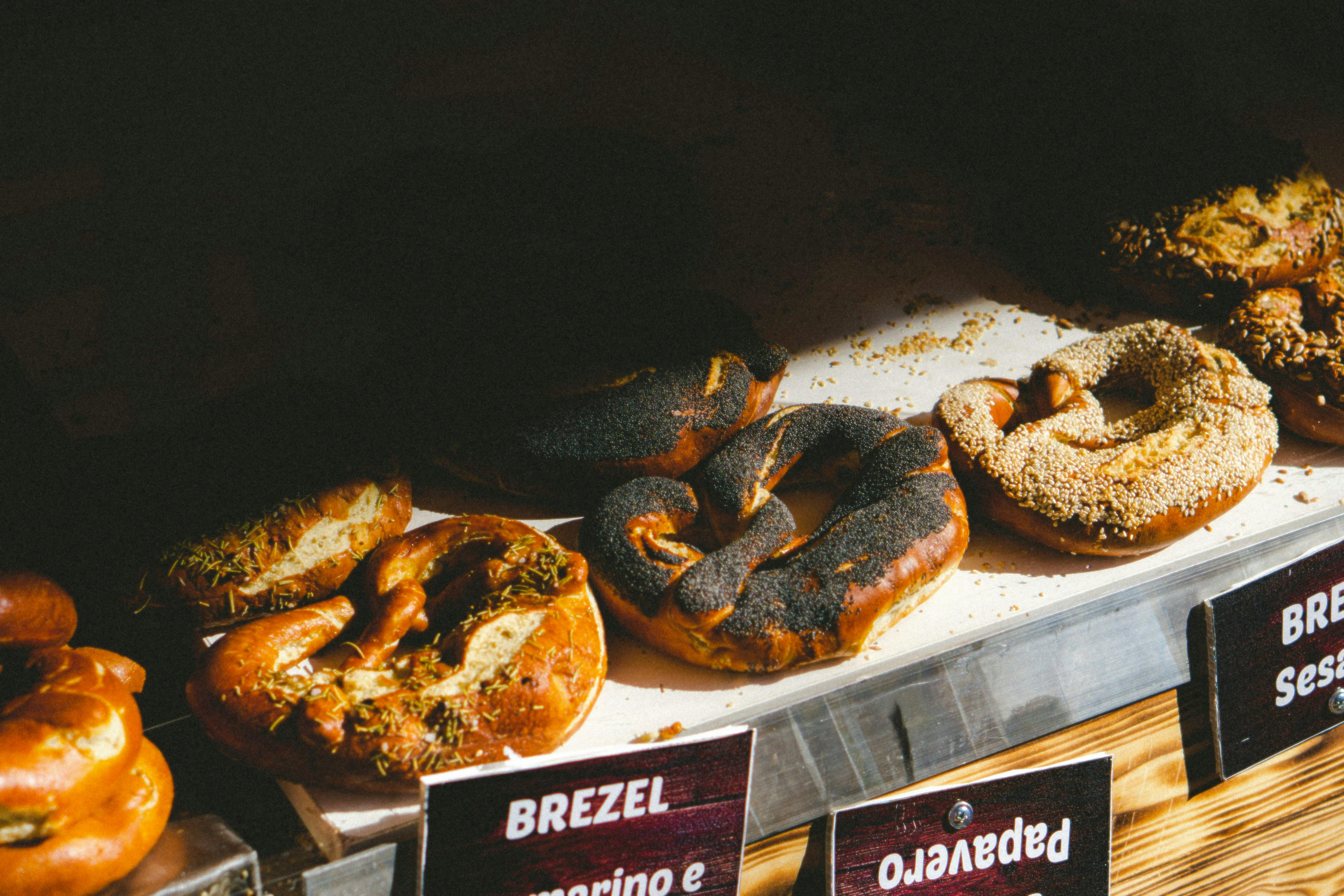 A display case showing a variety of pretzels
