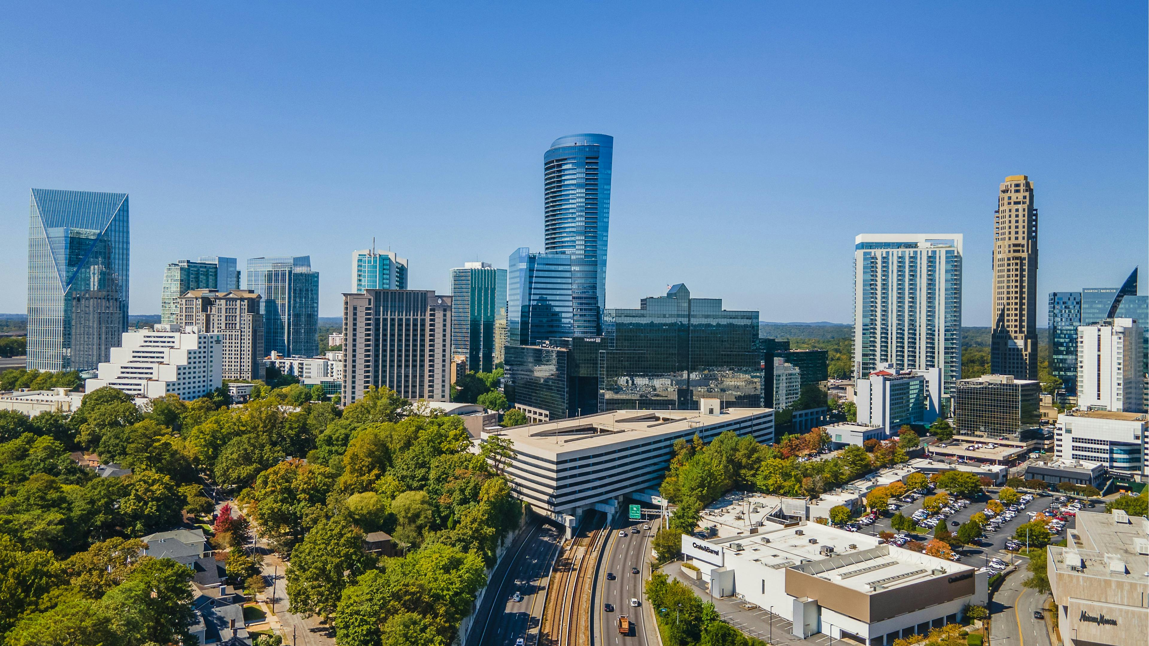 An aerial photo of Buckhead in Atlanta with a highway running through the middle