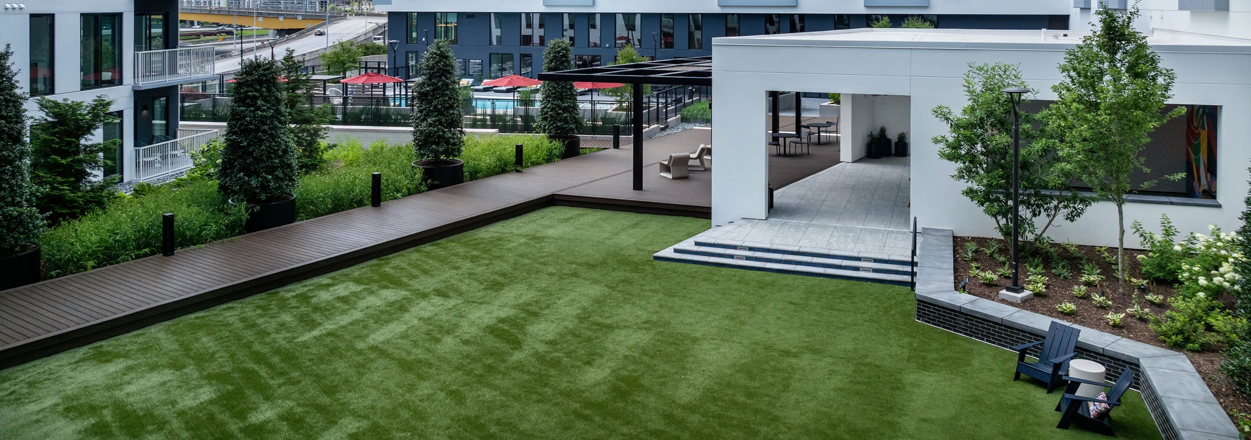 Greenspace in AMLI Atlantic Station courtyard with interior facing balconies.