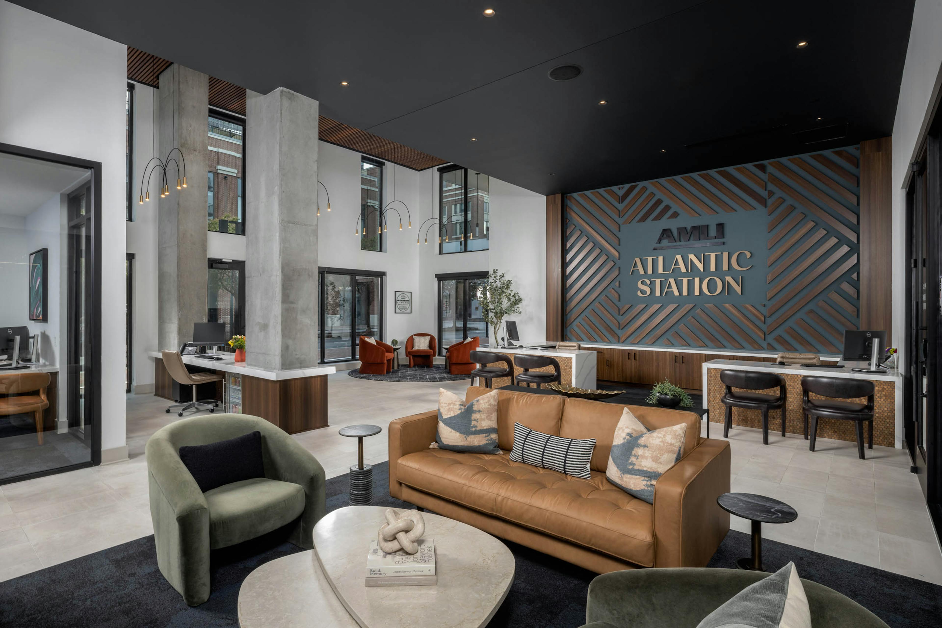 View of the leasing office with desks and seating at AMLI Atlantic Station.