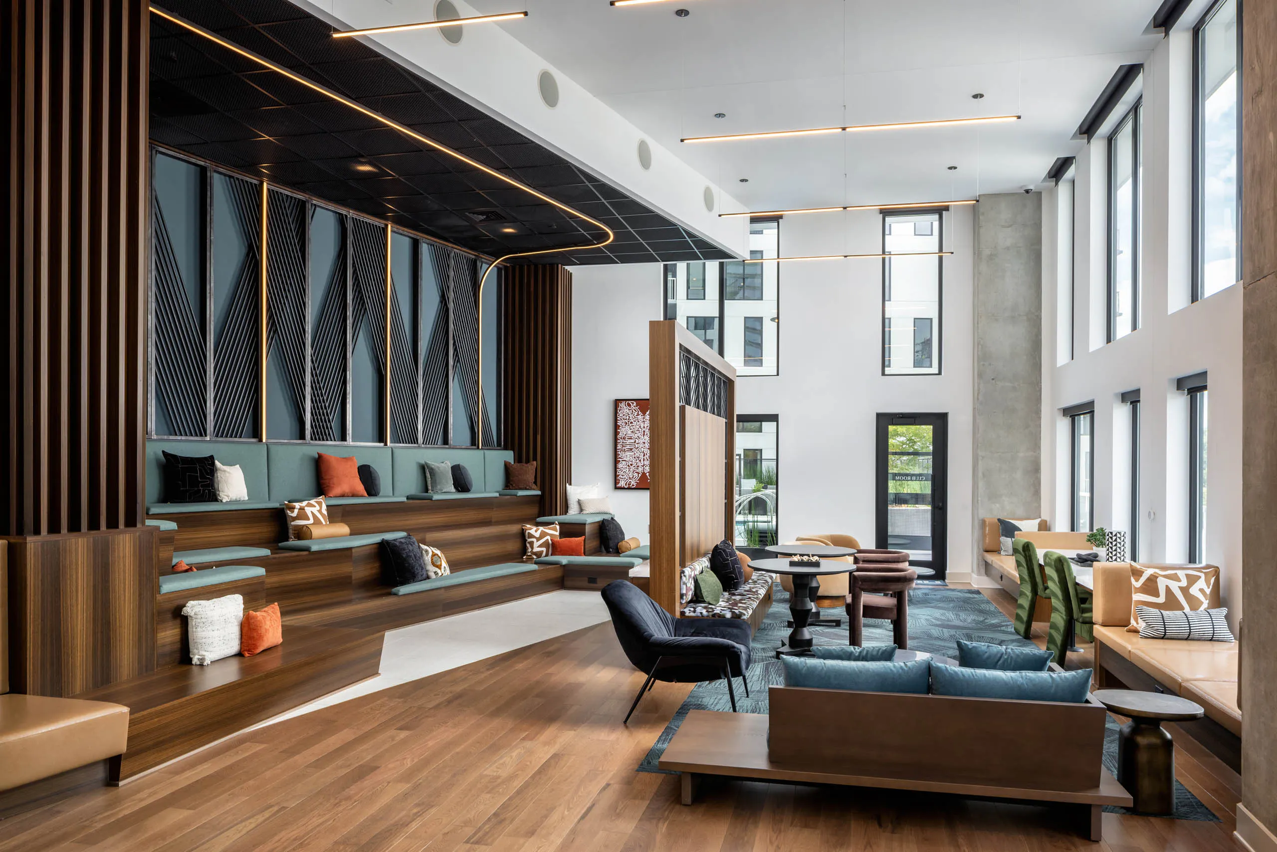 Raised seating and televisions in AMLI Atlantic Station’s clubroom.