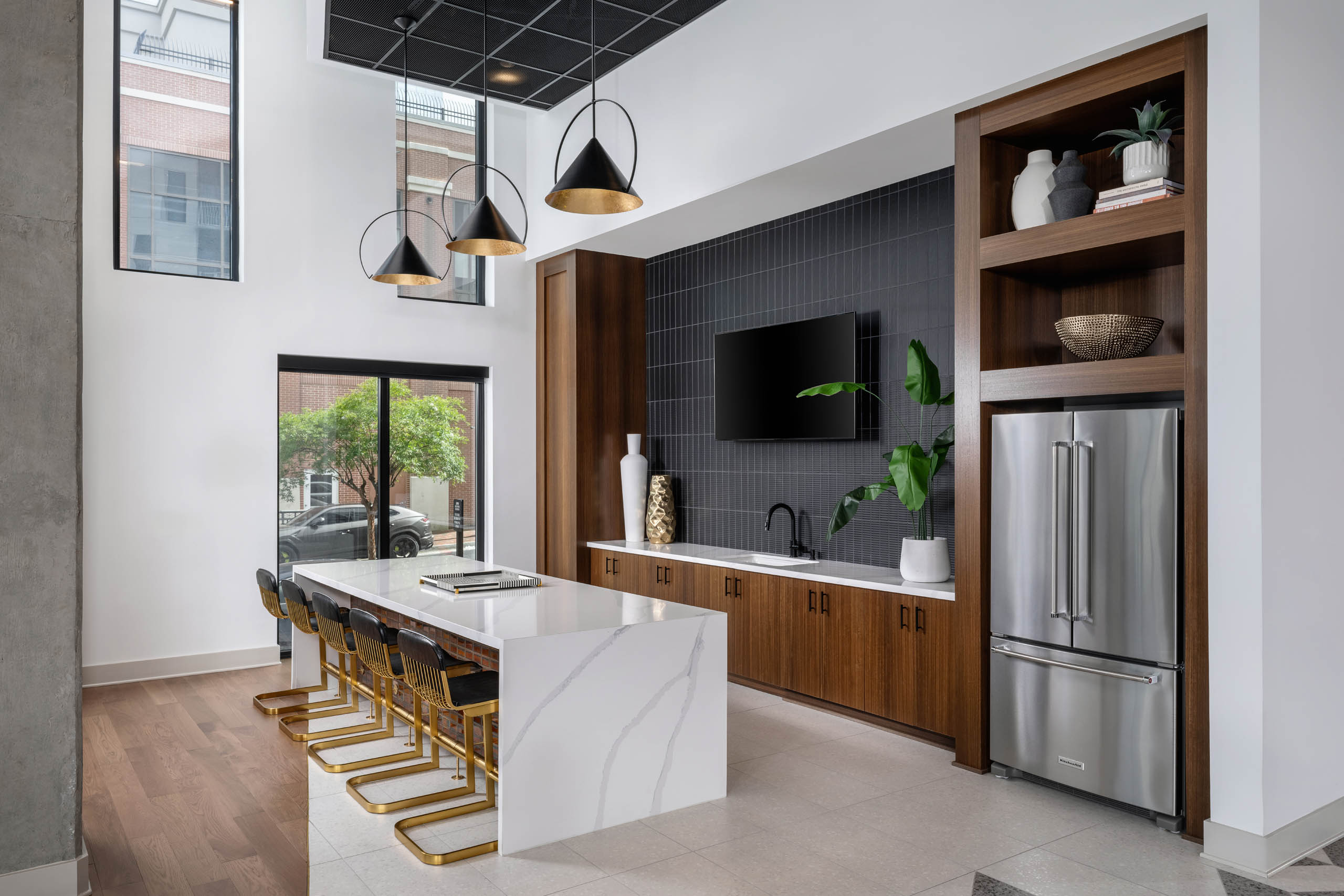 Clubroom bar area with white marble countertop at AMLI Atlantic Station.
