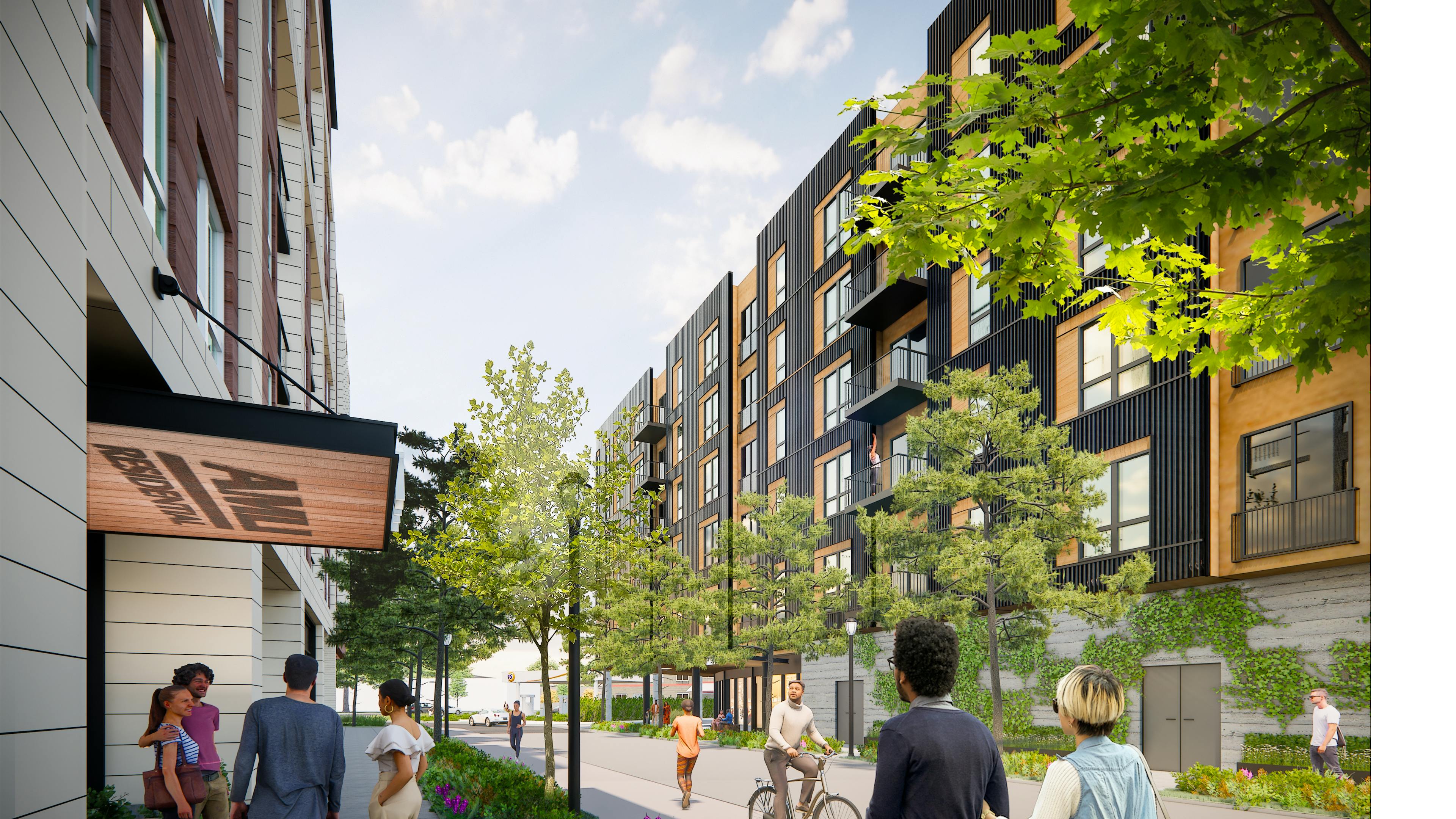 Exterior view of AMLI Redmond Way apartments with multi-story buildings, balconies, trees, and people walking along landscaped path