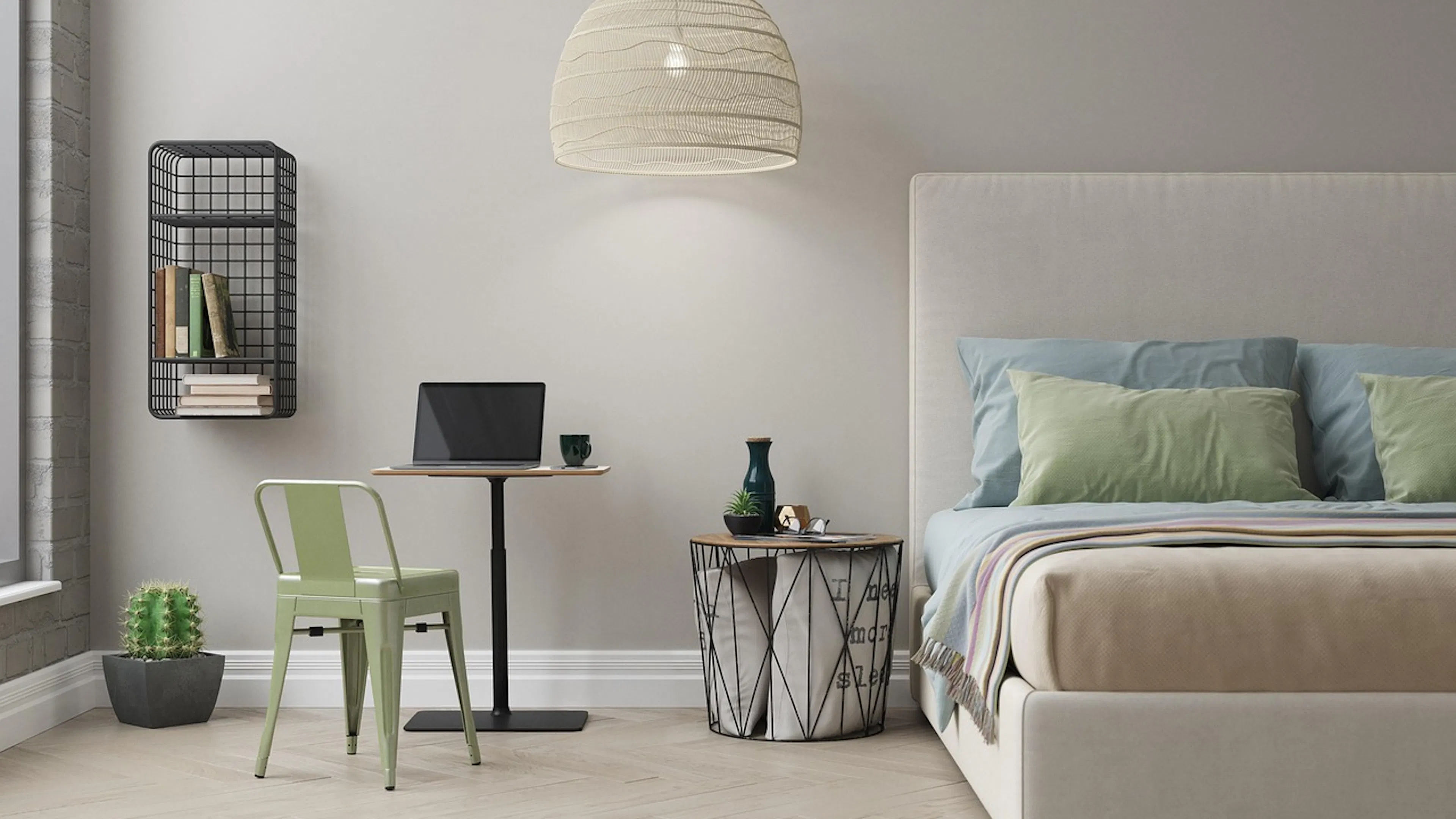 bedroom with green chair and desk and bed with cream blue and green bedding and cream hanging light