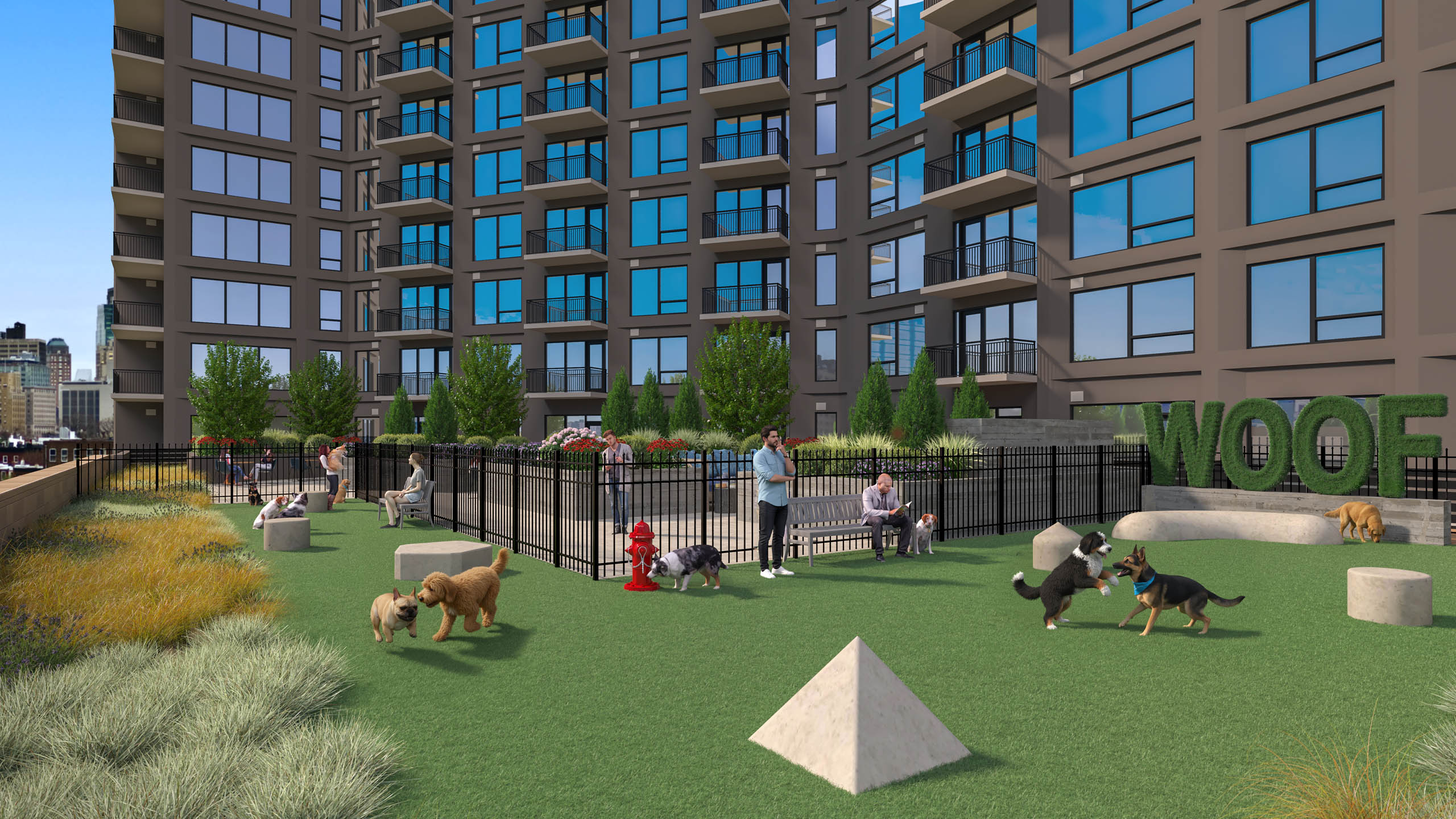 Exterior view of rooftop terrace with outdoor pool and lounge chairs and landscaped plants at AMLI Golden Triangle.