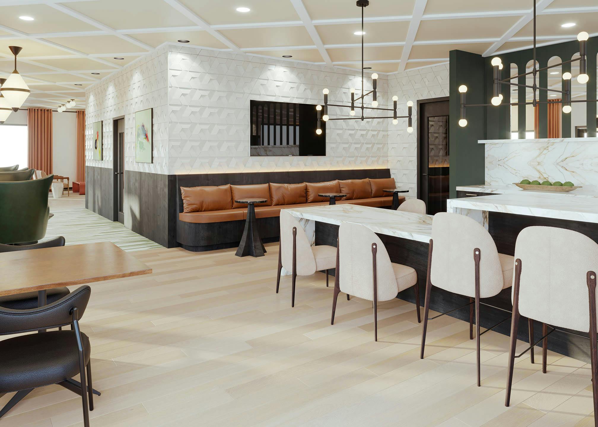 Modern lounge amenity at AMLI Golden Triangle with marble countertops and brown leather bench seating with contemporary light fixtures
