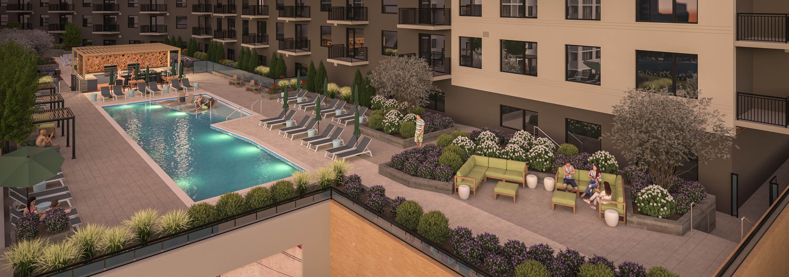 Exterior view of rooftop terrace with outdoor pool and lounge chairs and landscaped plants at AMLI Golden Triangle.