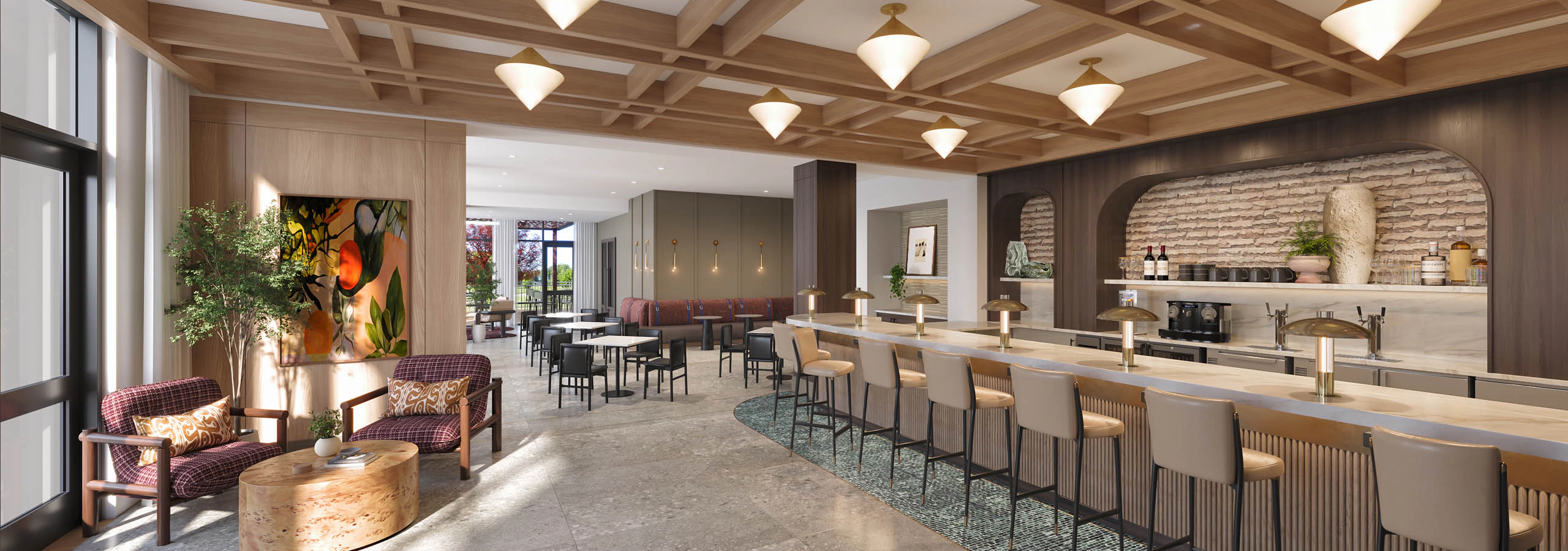 café and wine bar at AMLI Treehouse featuring modern design and bar top with several bar stools and restaurant seating