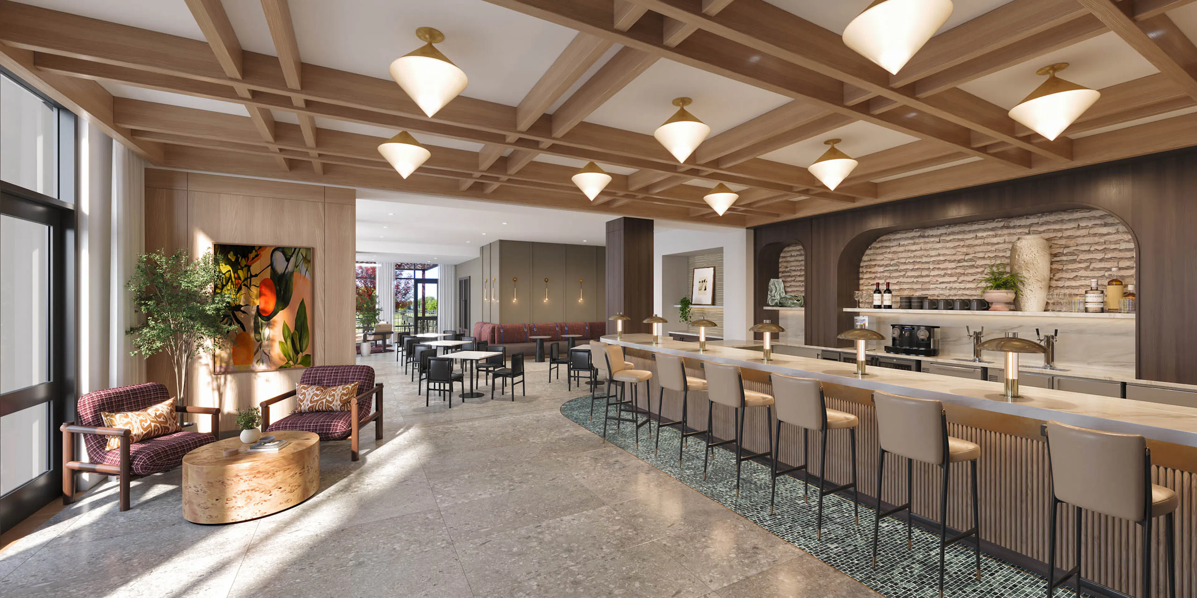 café and wine bar at AMLI Treehouse featuring modern design and bar top with several bar stools and restaurant seating